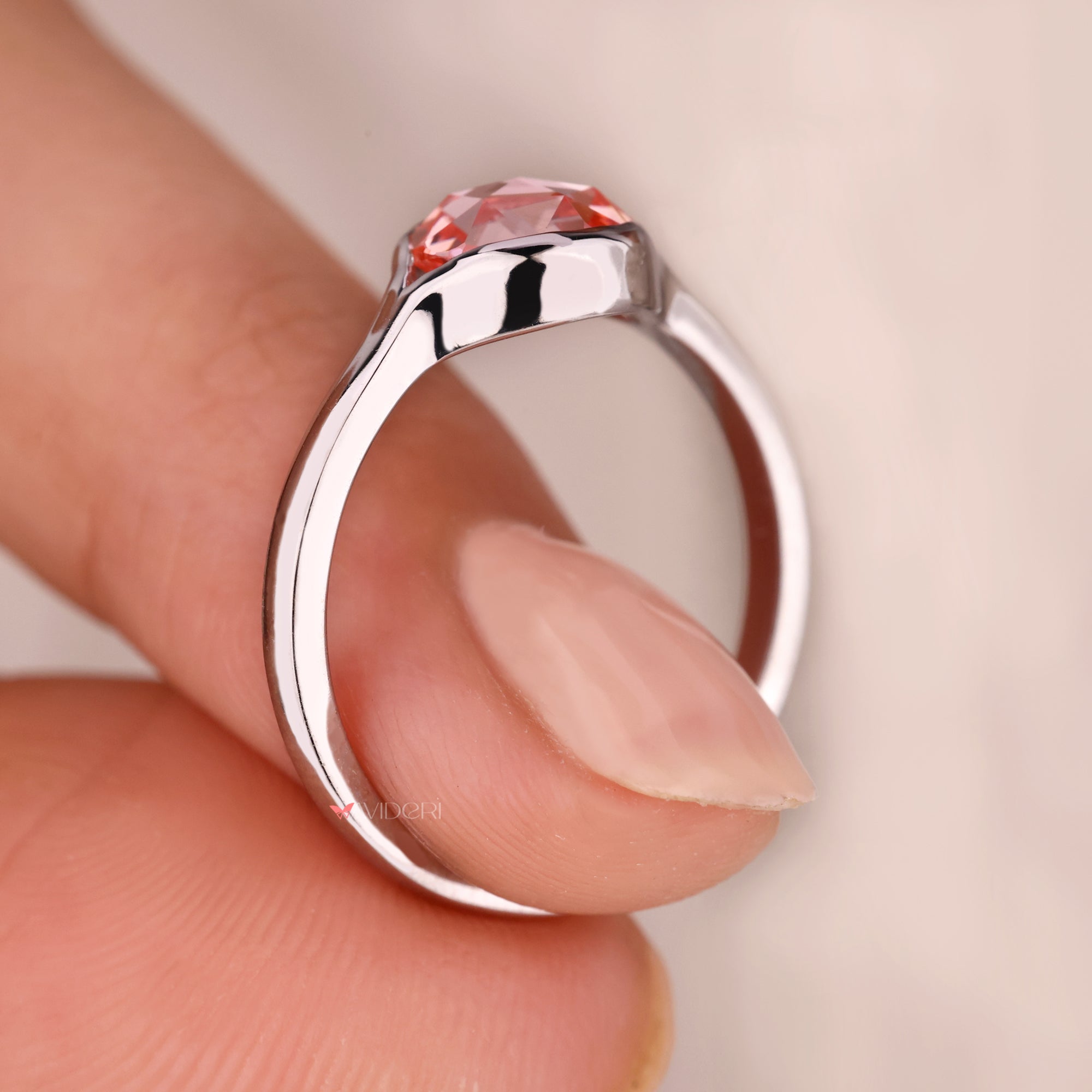 White gold engagement ring with lab-grown diamond ring.