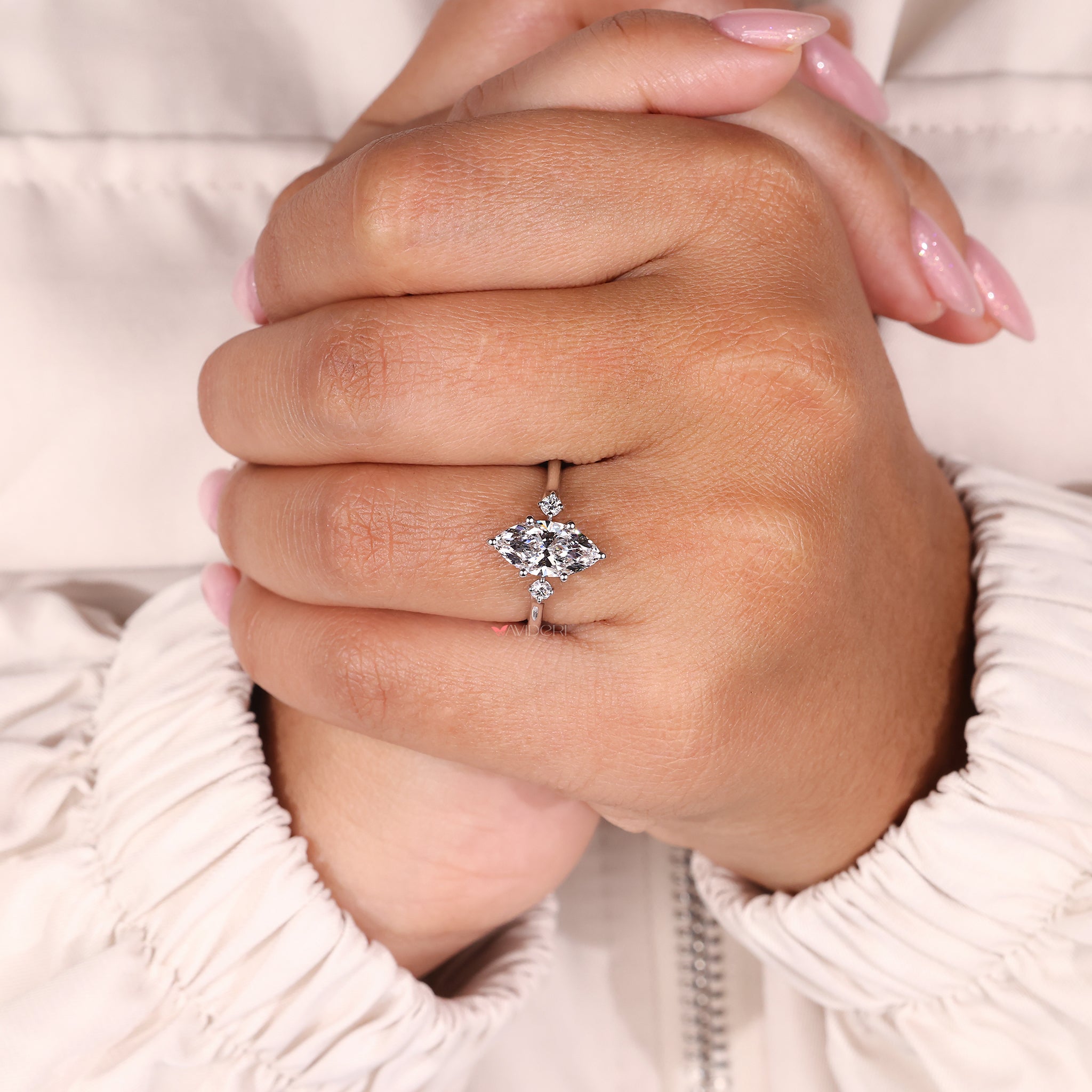IGI certified Lab Grown Diamond in a shared prong setting.