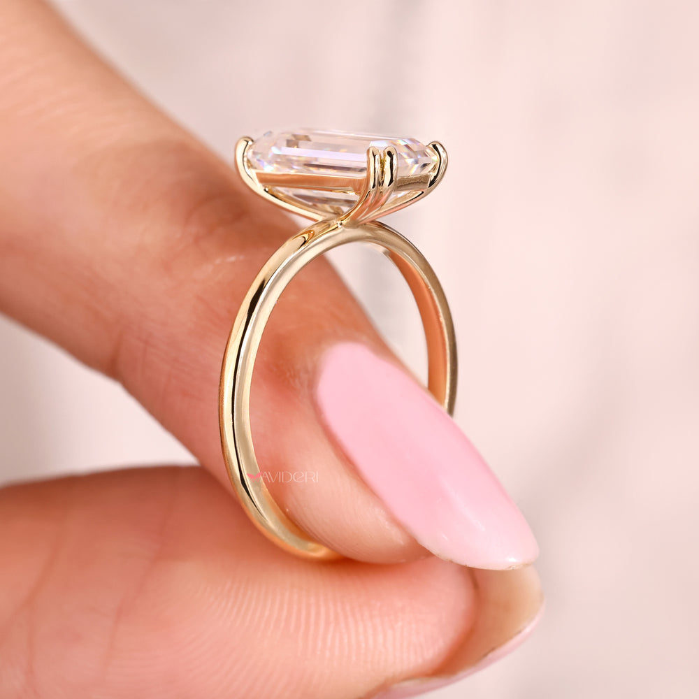 Handmade emerald cut moissanite solitaire ring.
