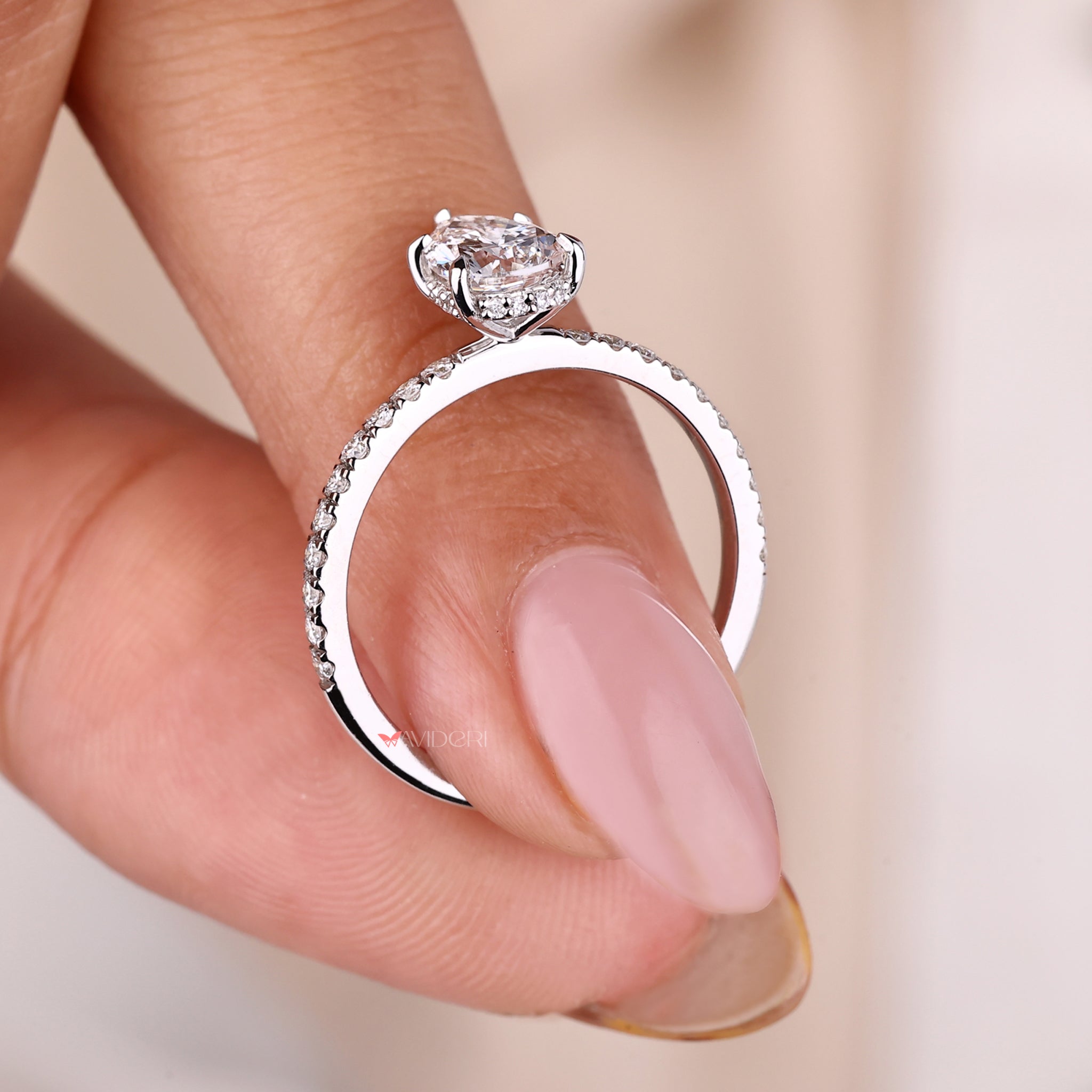 Pear Engagement Ring with claw prong and hidden halo for extra sparkle.