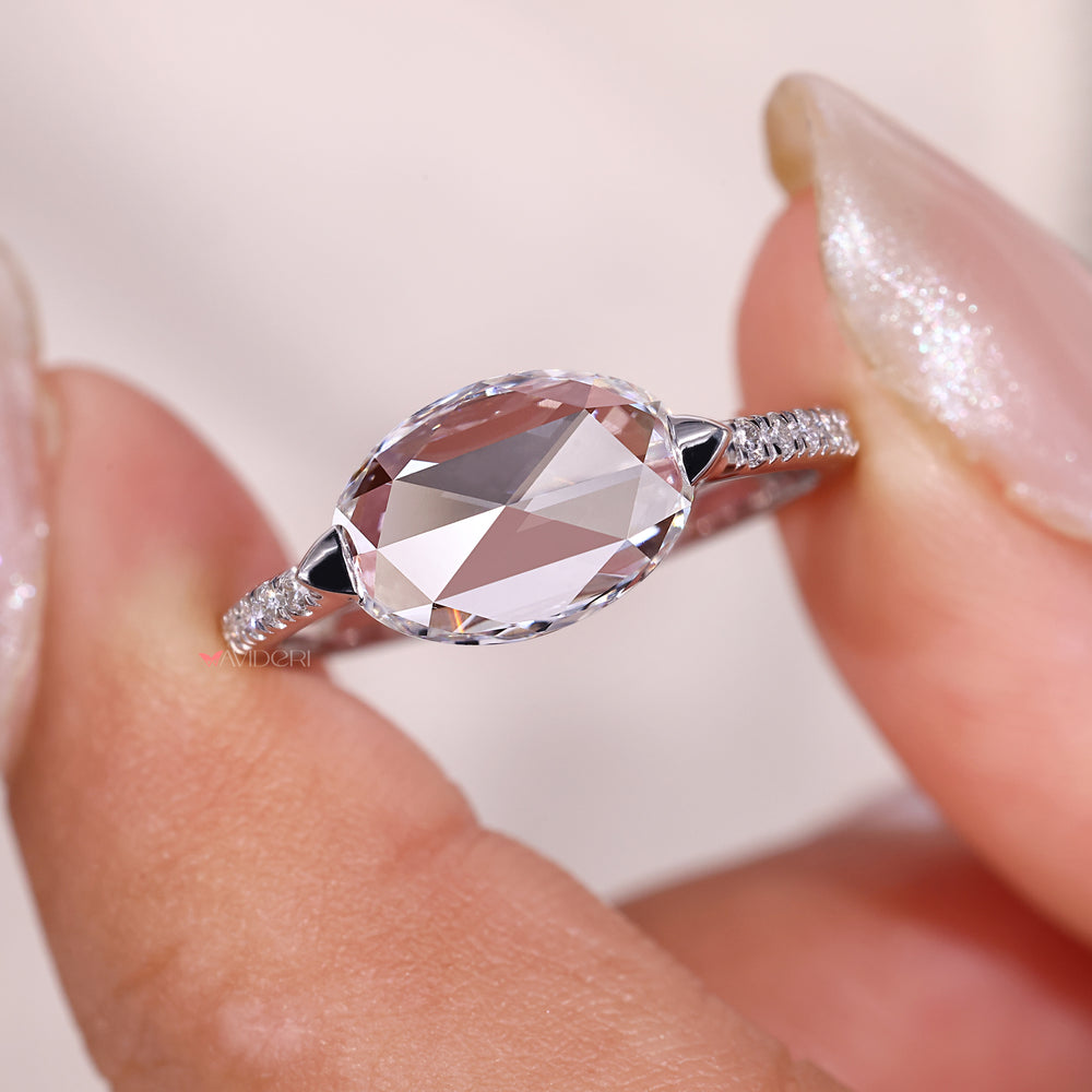 Handmade jewelry featuring an oval rose cut center.