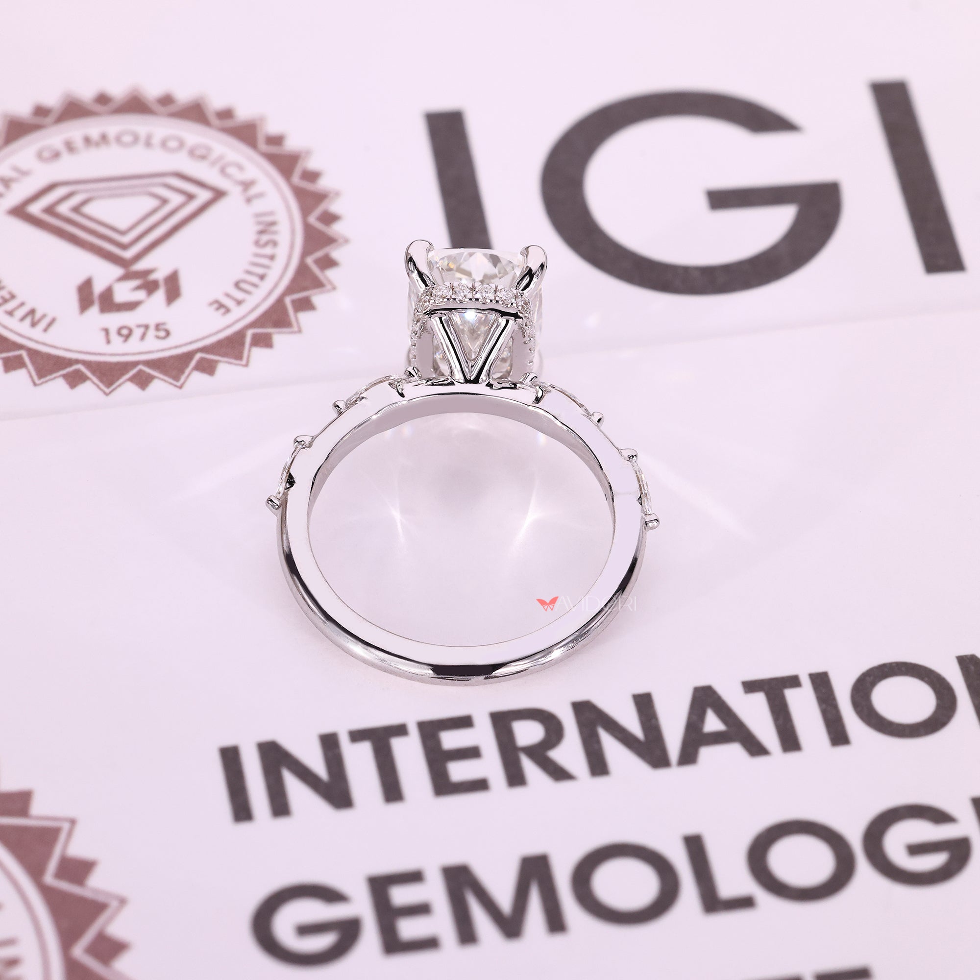 White gold ring with a clean four prong setting.