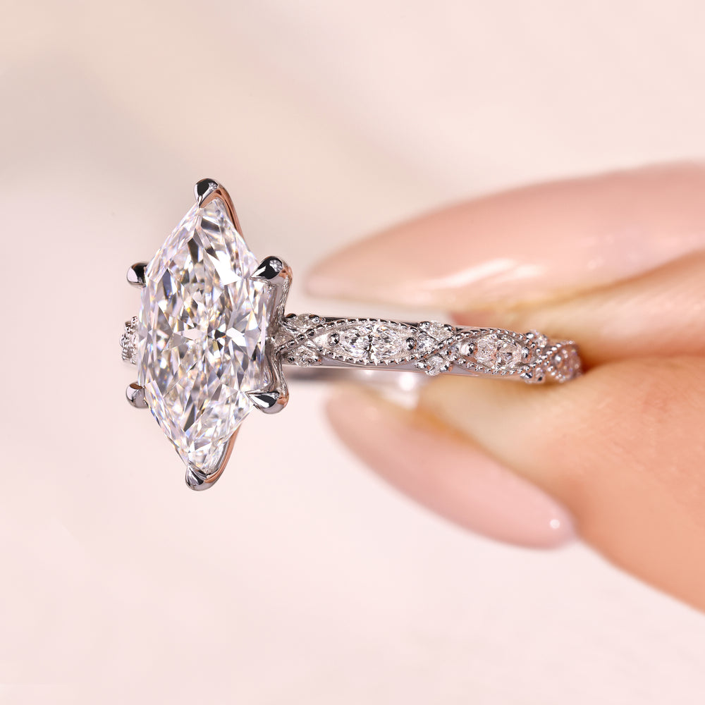 IGI certified marquise diamond ring with vintage style band.

