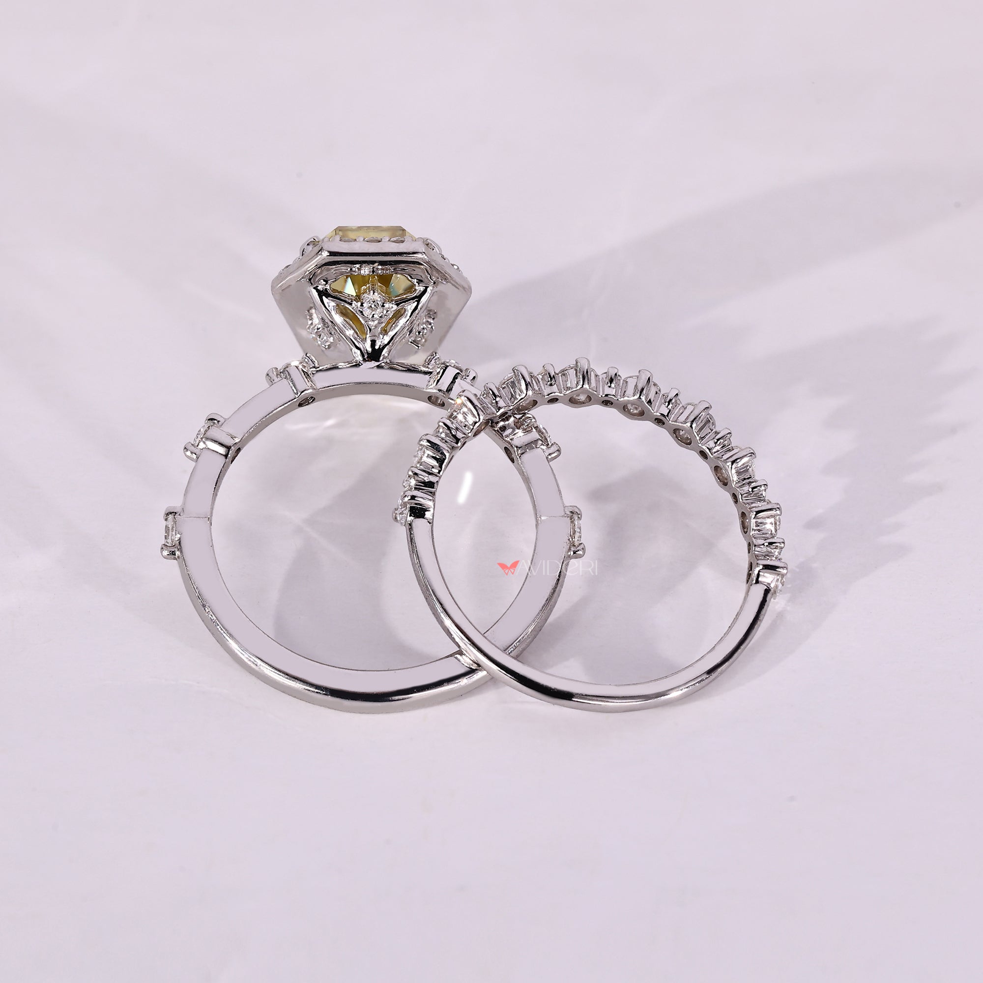 White gold wedding band with moissanite bridal set.