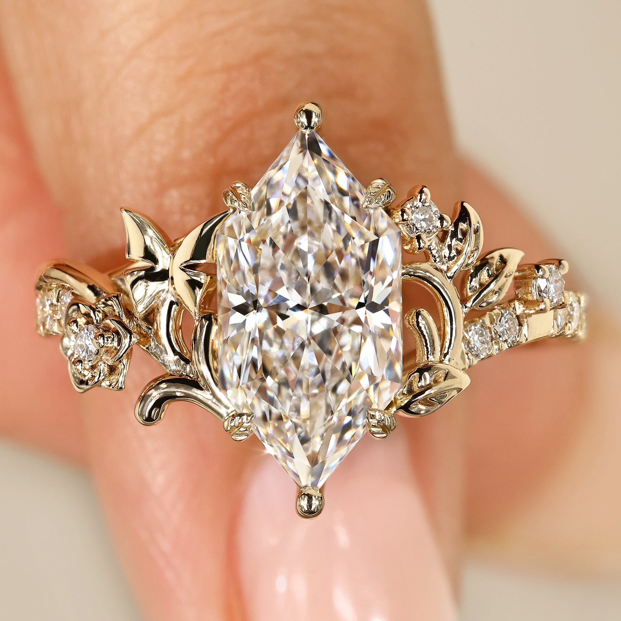 Dutch marquise diamond ring with round side stones.
