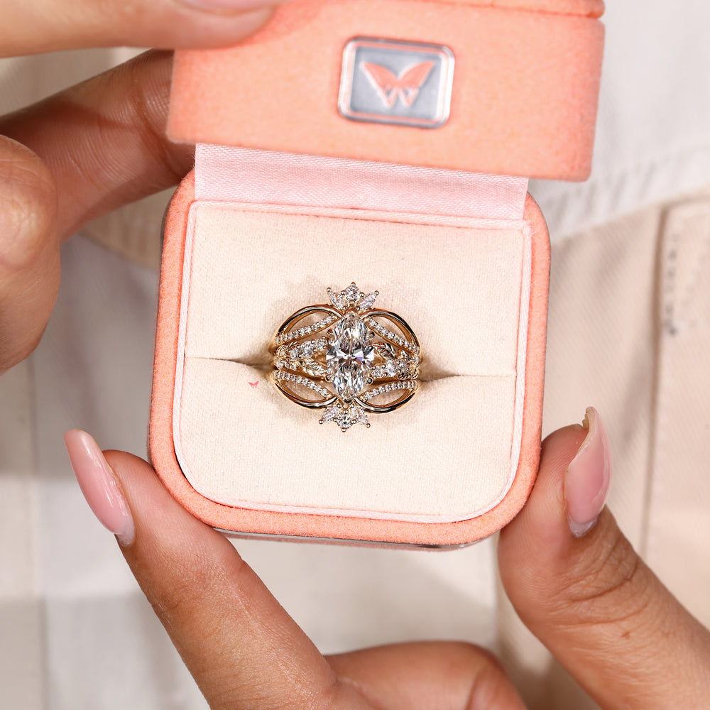 Marquise diamond ring with two V shape prong setting
