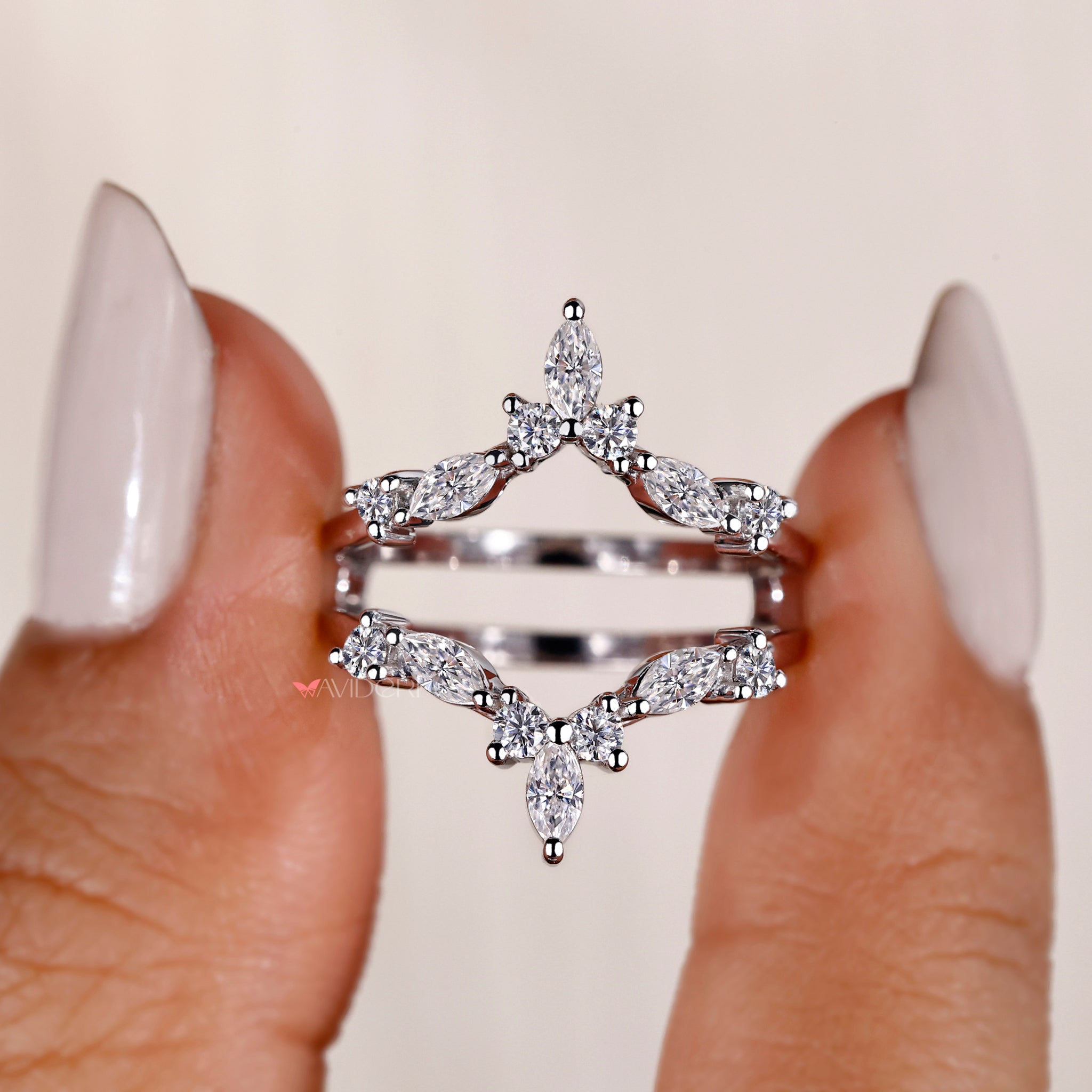 Marquise and round diamond wedding band shine brightly.
