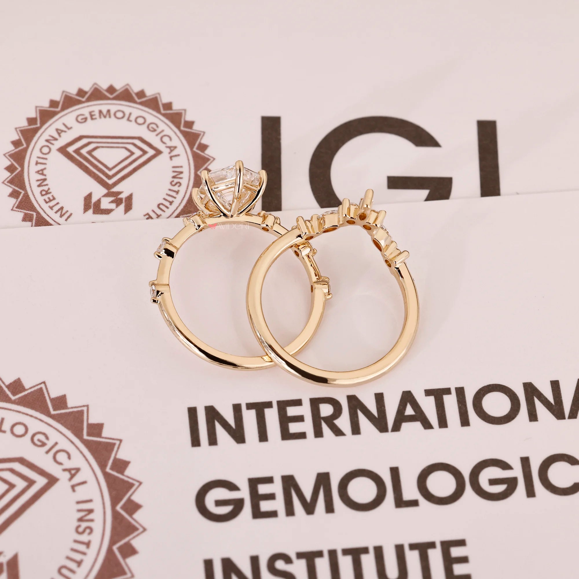 Yellow gold bridal set with hexagon step cut ring.