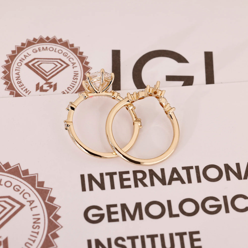 Yellow gold bridal set with hexagon step cut ring.