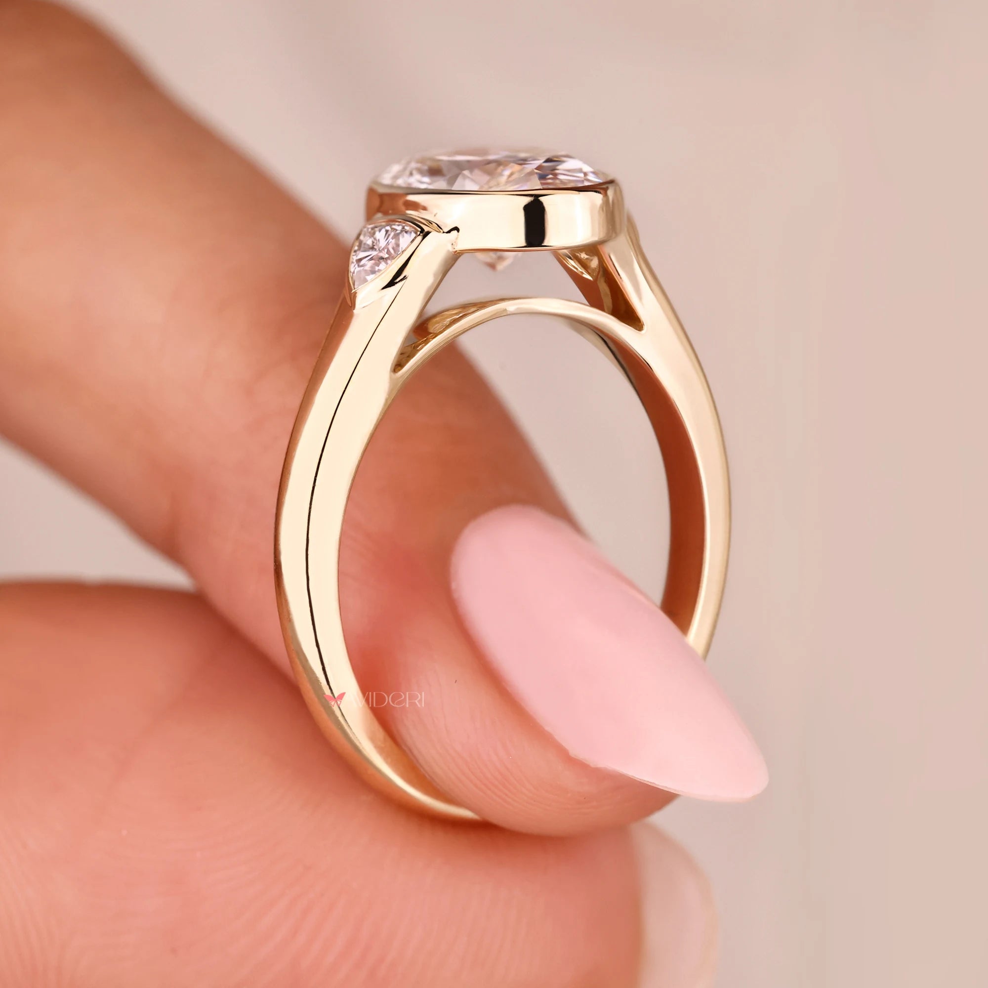 Three Stone Oval Engagement Ring In Yellow Gold