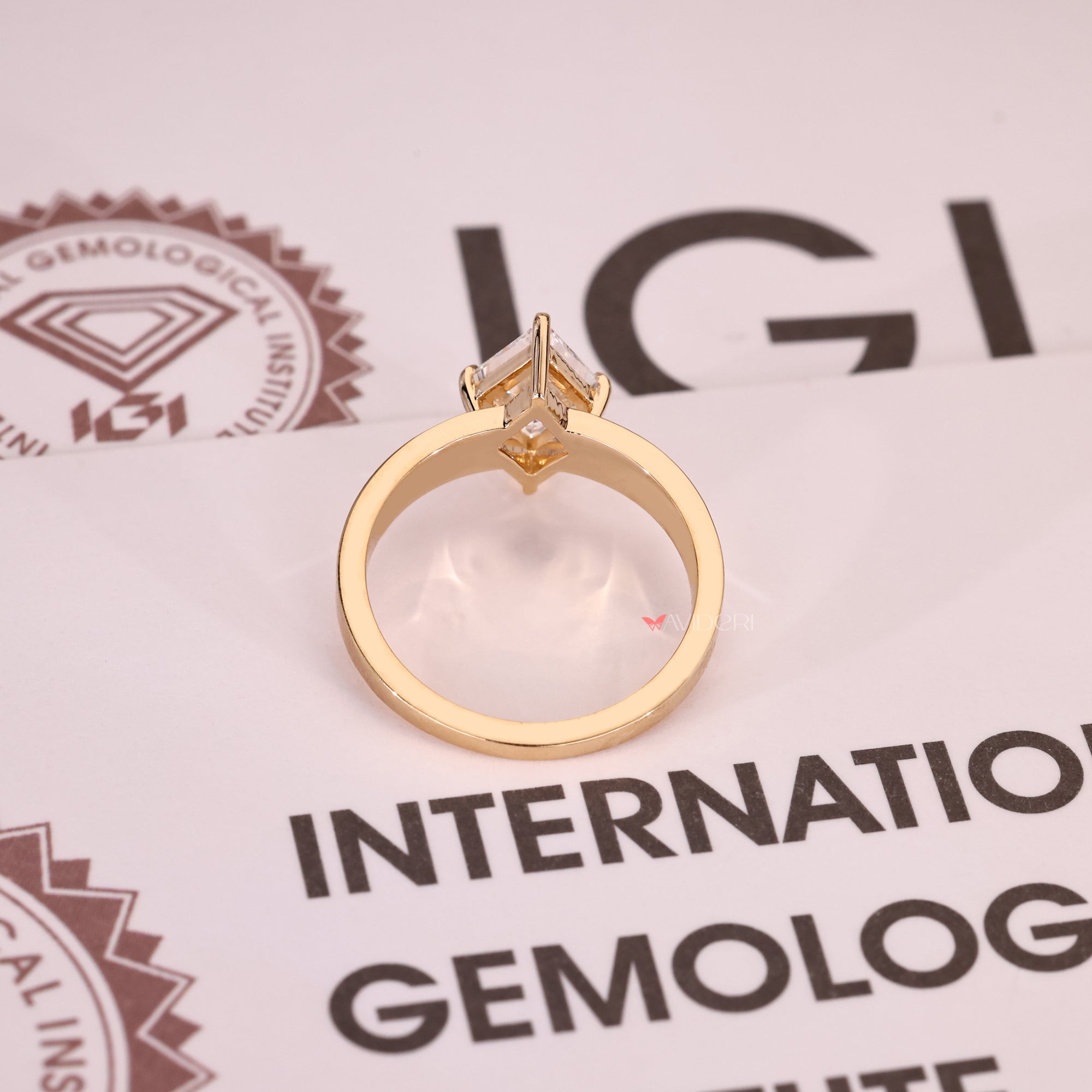 Yellow gold engagement ring with solitaire engagement ring.