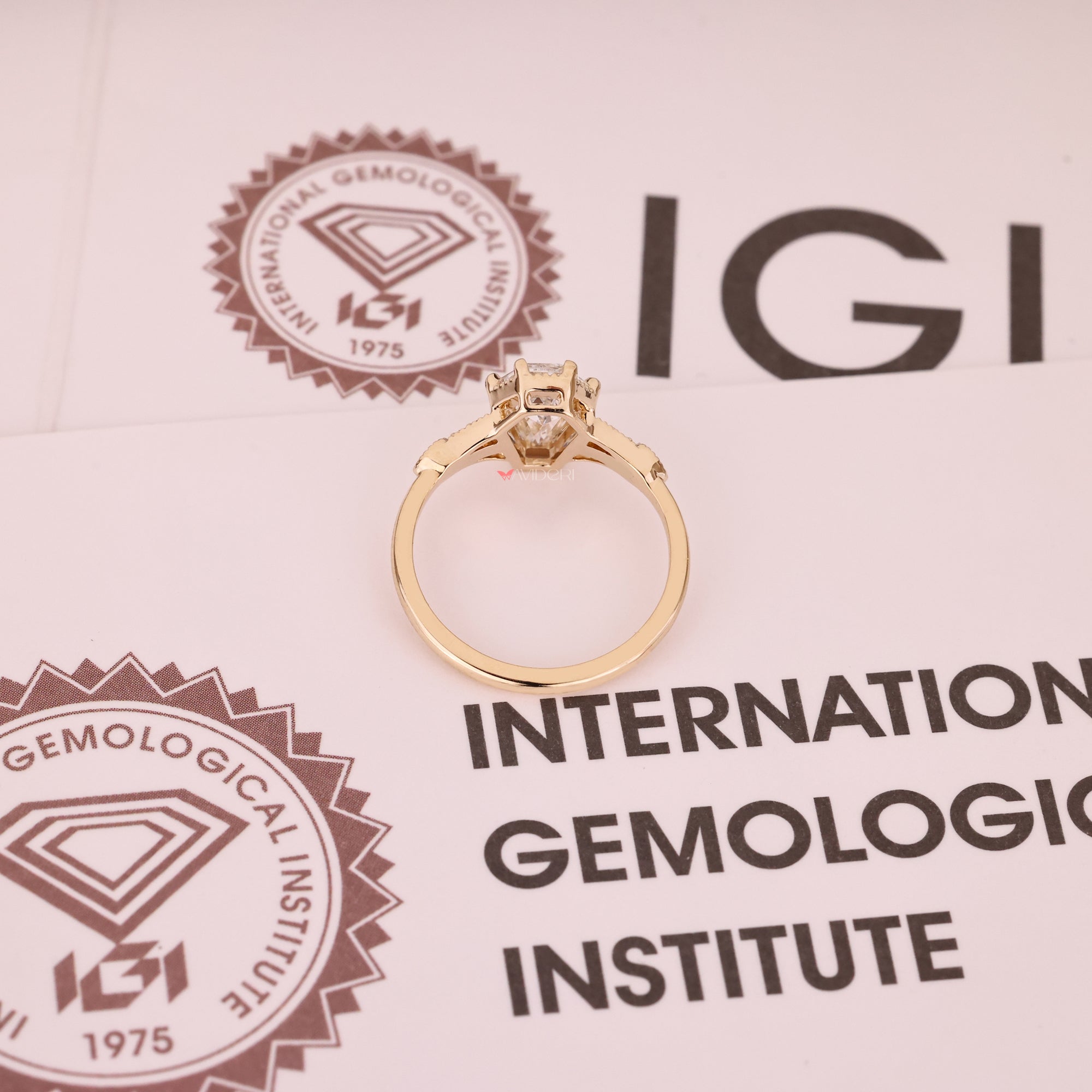 IGI certified coffin cut engagement ring in yellow gold.