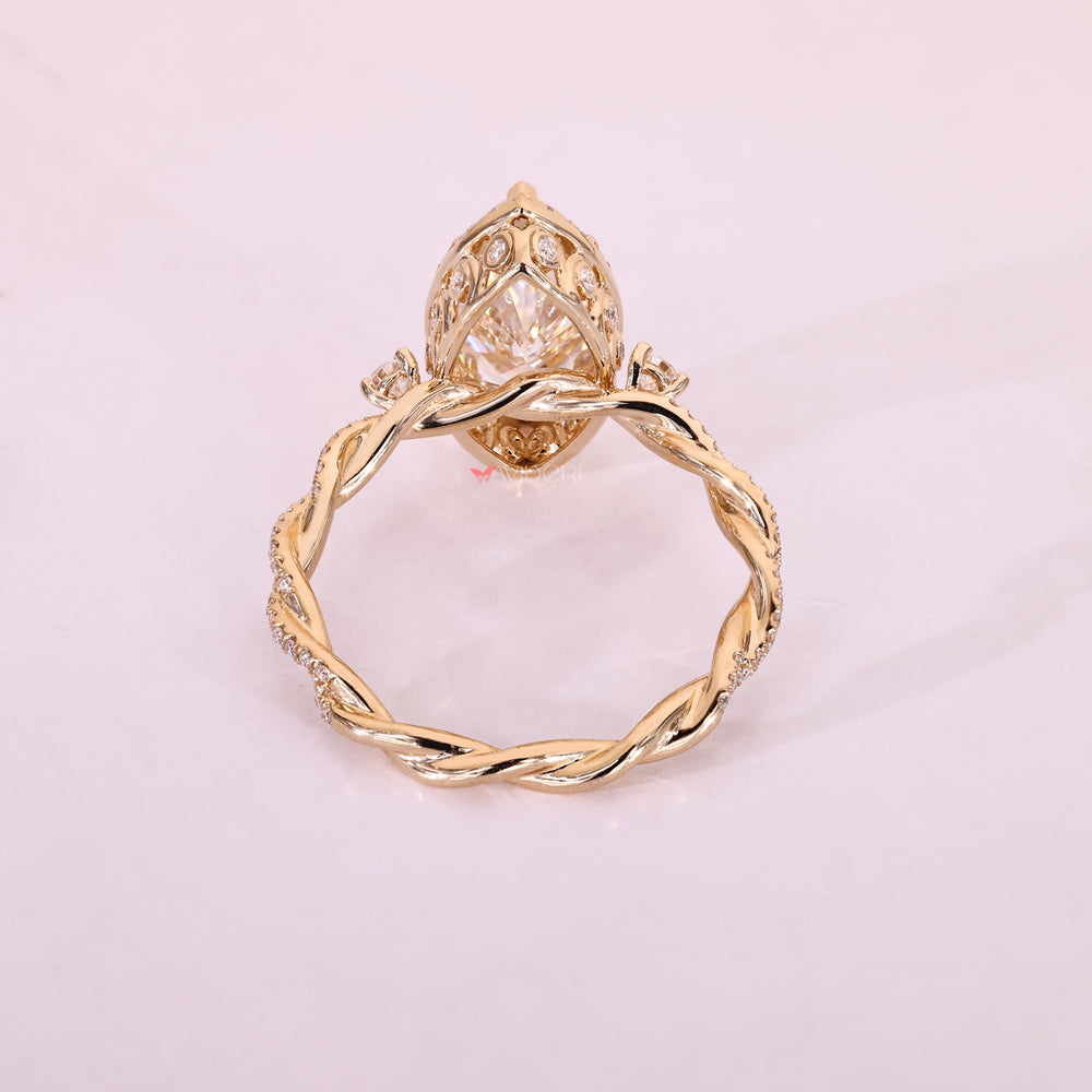 Handmade vintage engagement ring with moissanite halo.