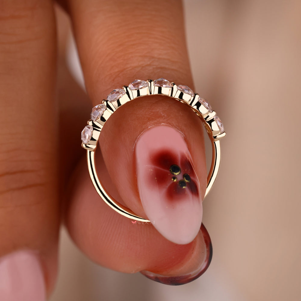 Round rose cut band in yellow gold.
