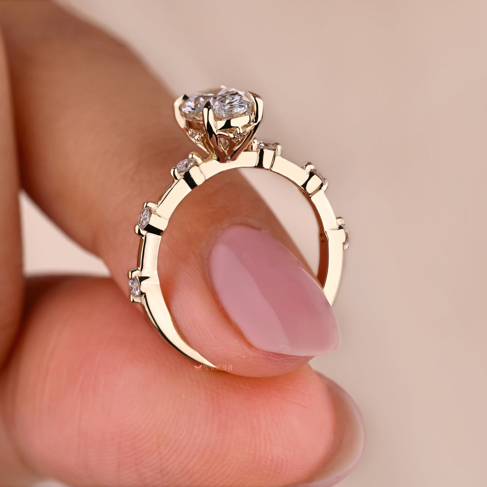 Oval shaped engagement ring featuring igi certified diamonds and a handmade jewelry design for a personal touch.
