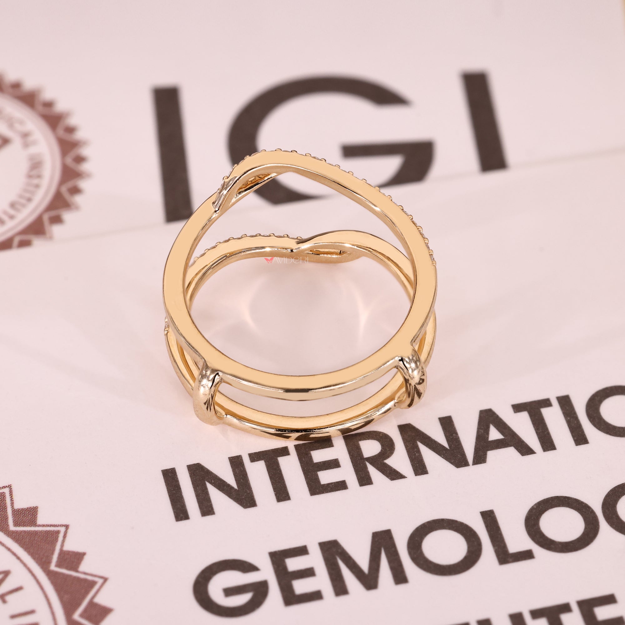 Yellow gold ring enhancer with round diamonds.