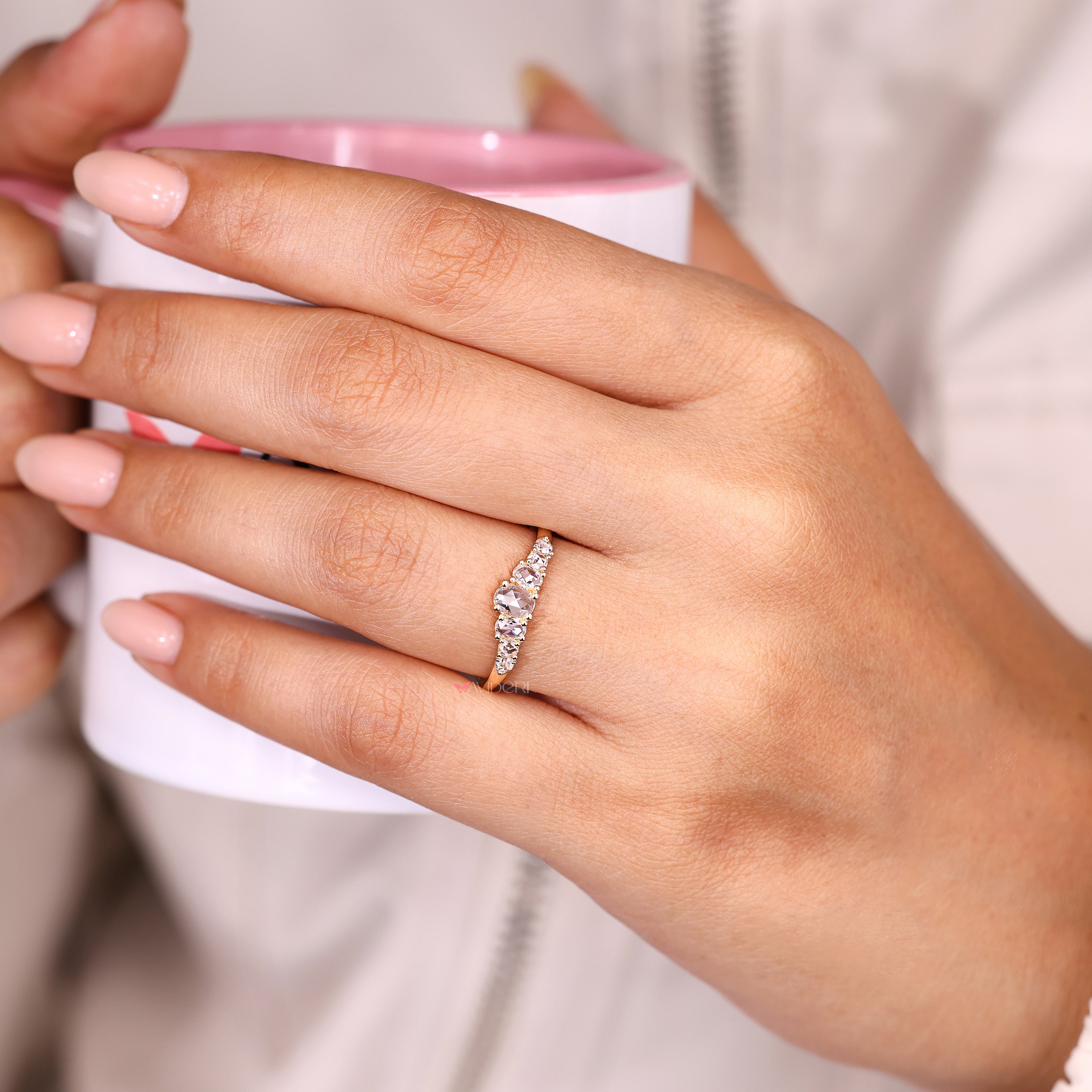 Oval and round rose cut diamond wedding band.
