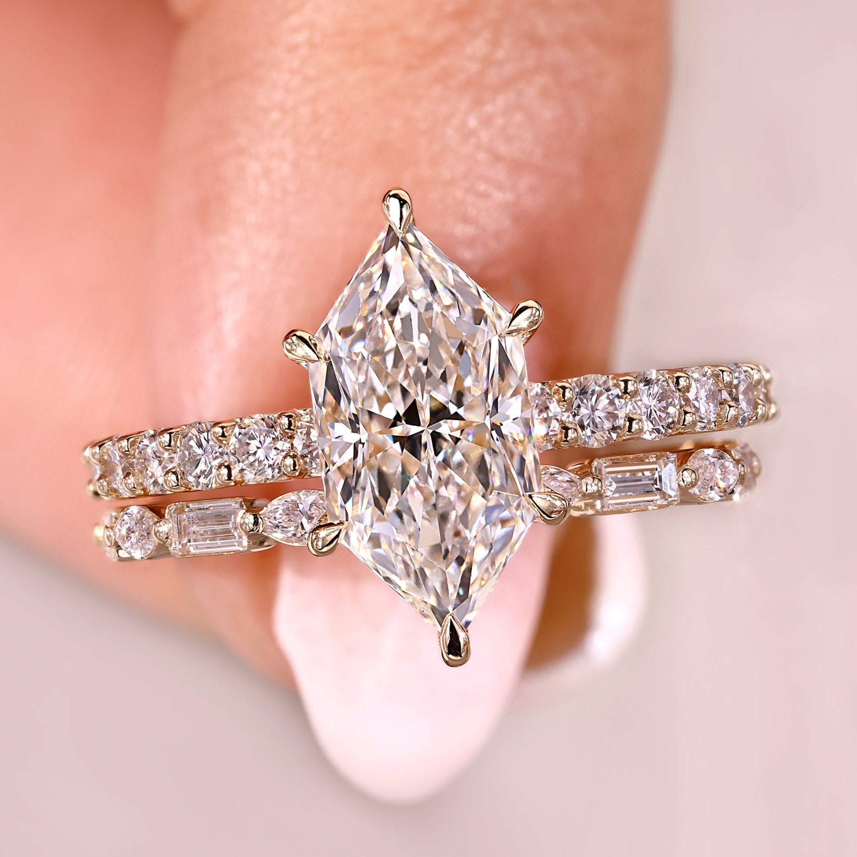Dutch marquise engagement ring with stackable wedding band.