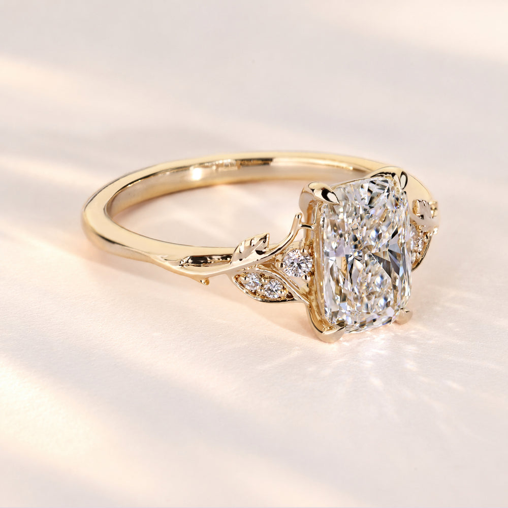 Lab grown cushion diamond ring with claw prongs.
