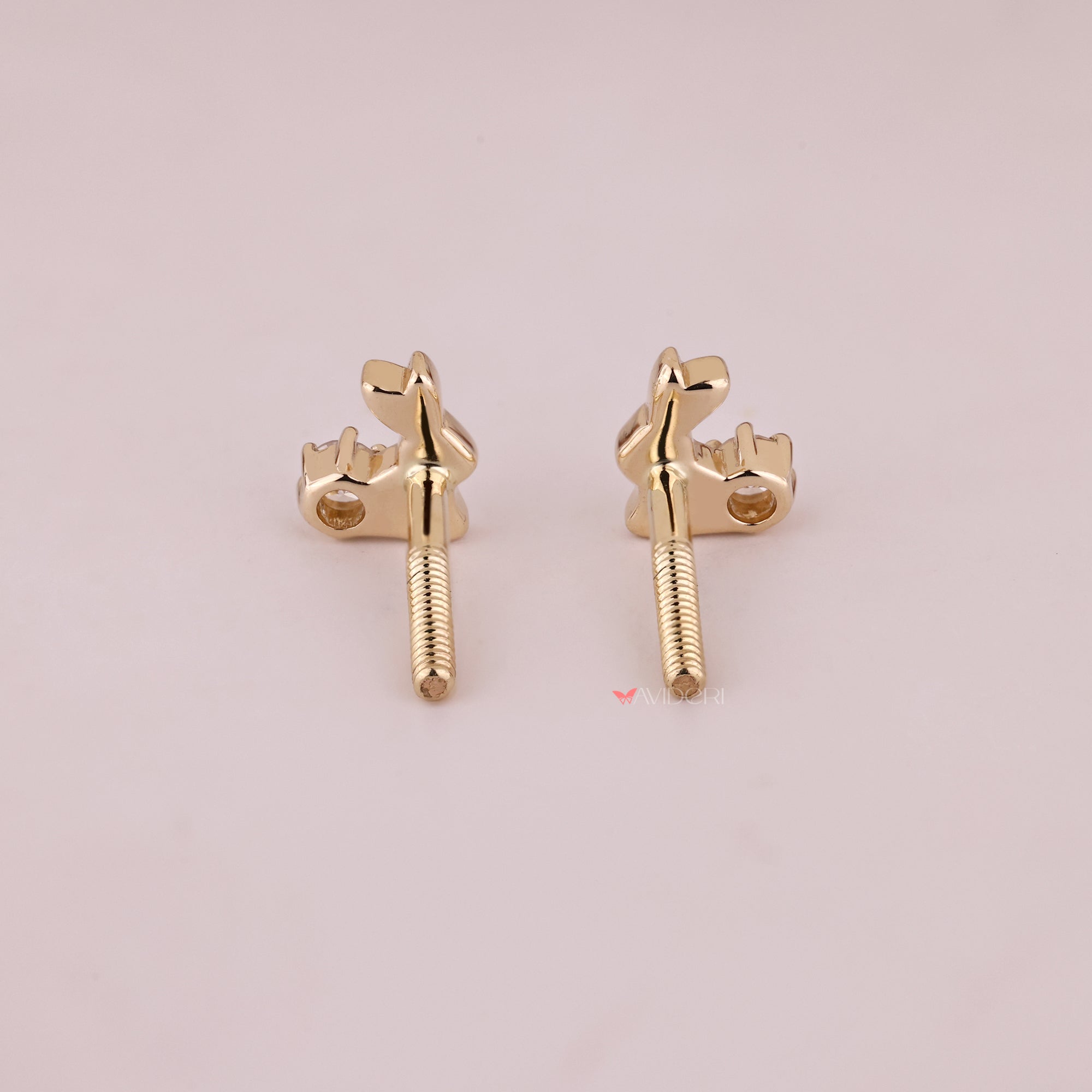 Gold rabbit earrings with lab grown diamonds.
