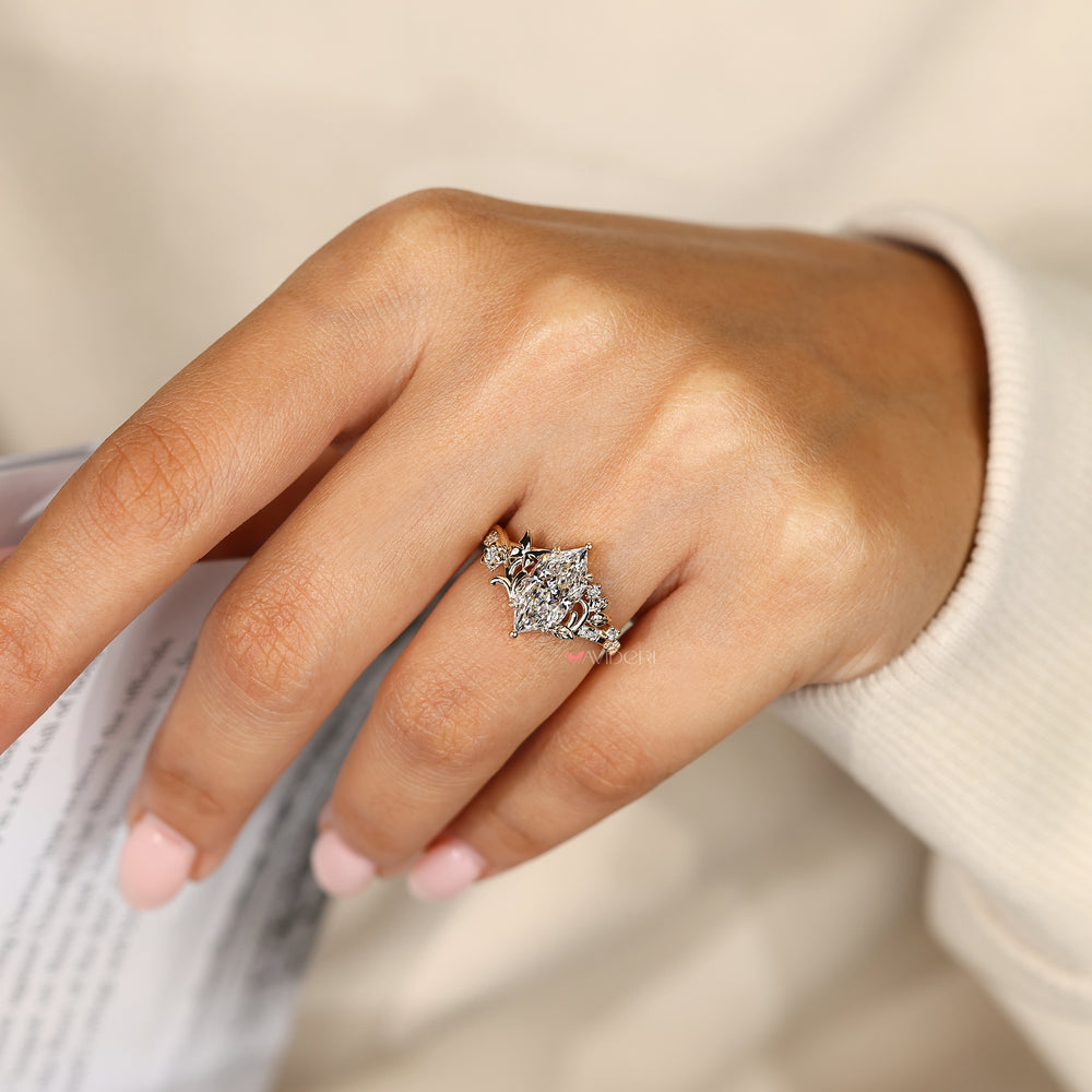 Dutch marquise ring with signature butterfly style.
