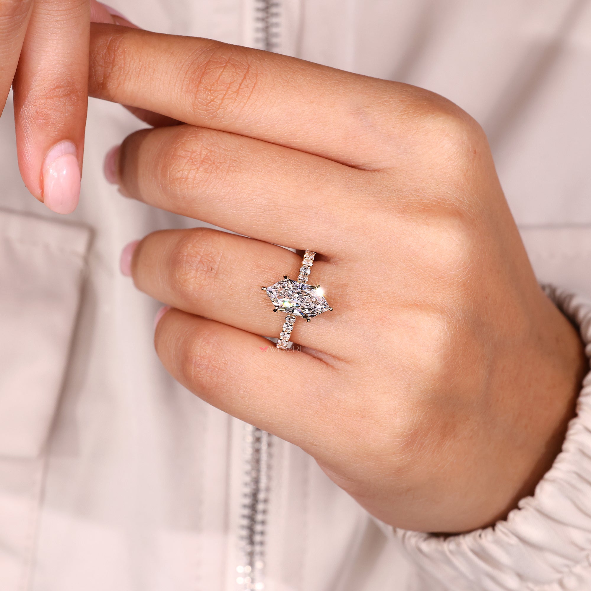 Six claw prong with yellow gold diamond ring.