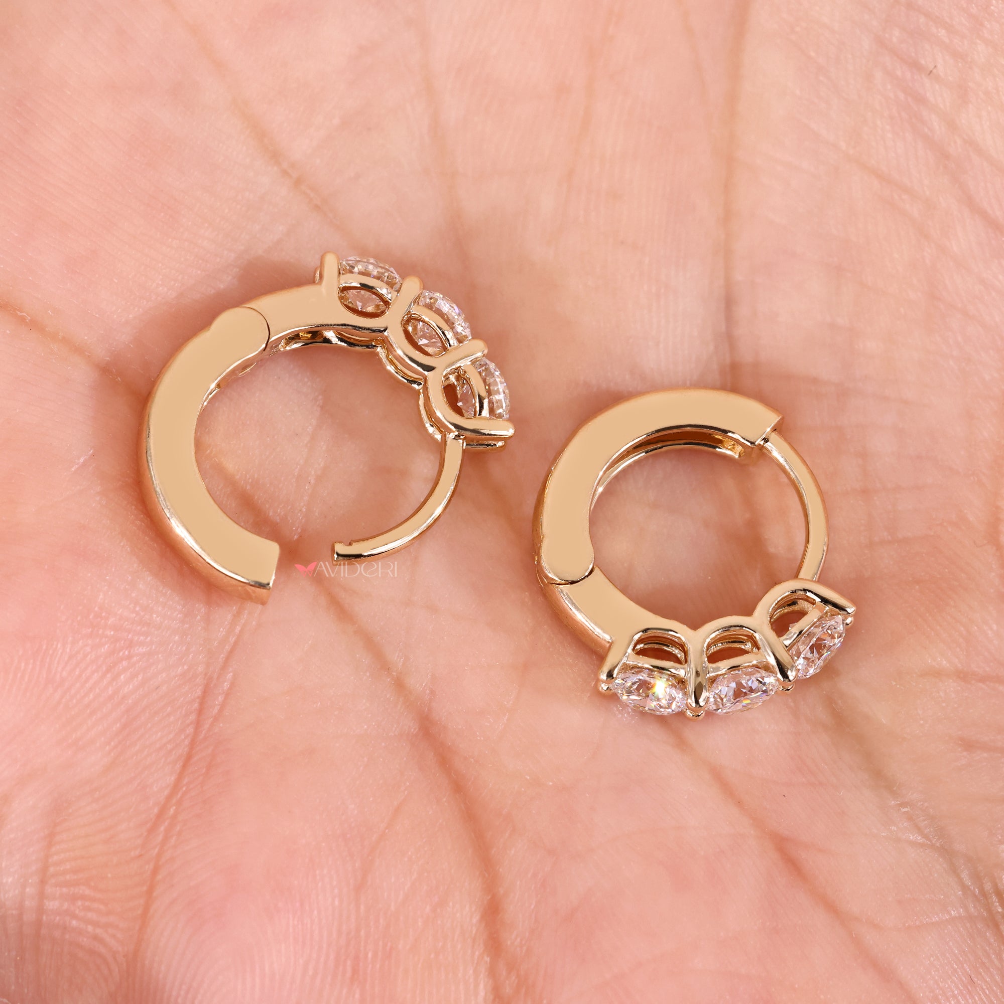 Yellow gold earrings with lab grown diamond earrings.