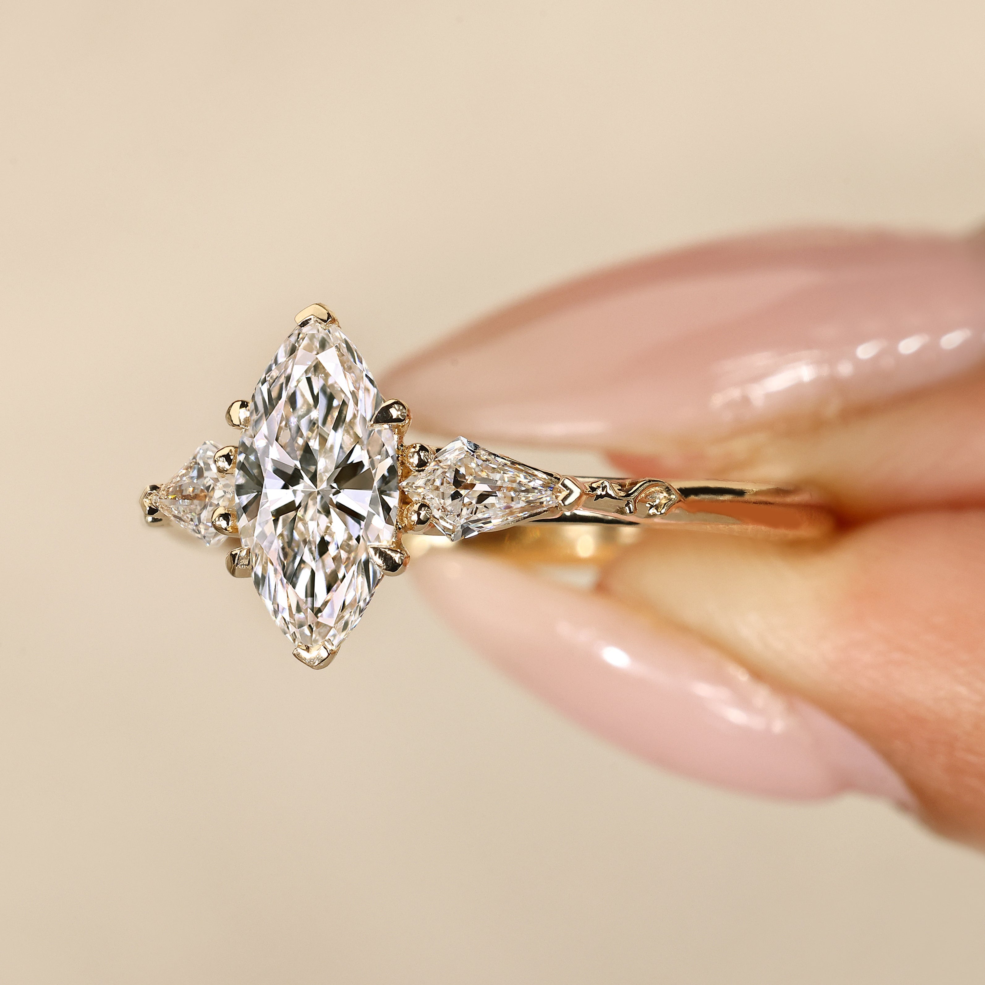 Handmade marquise diamond ring with kite stone.