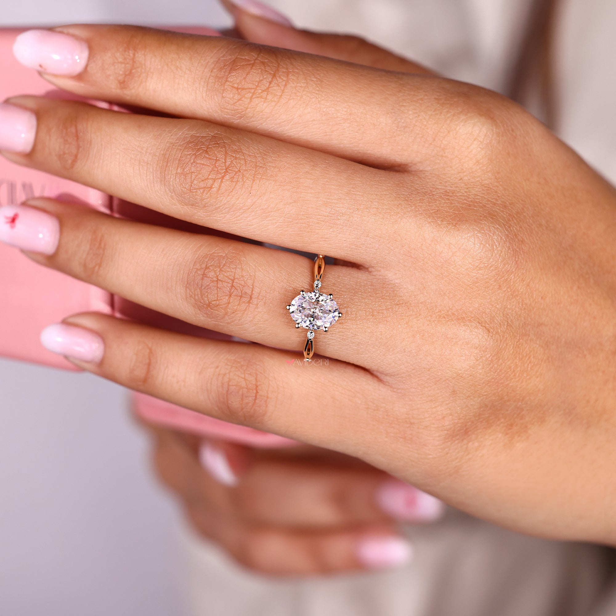Distance Pave Ring with brilliant stones set along the band.