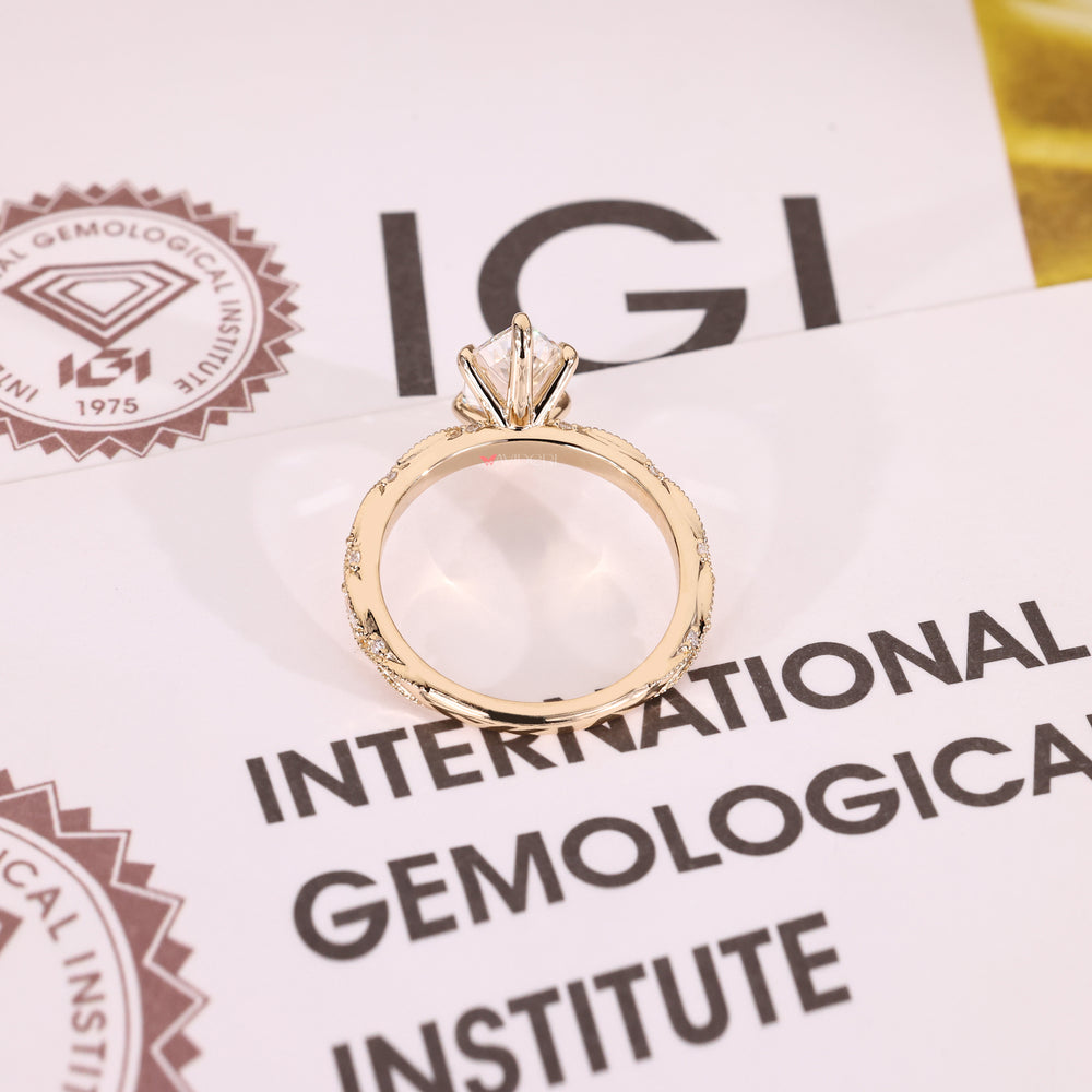 Yellow gold engagement ring with lab-grown diamond ring.