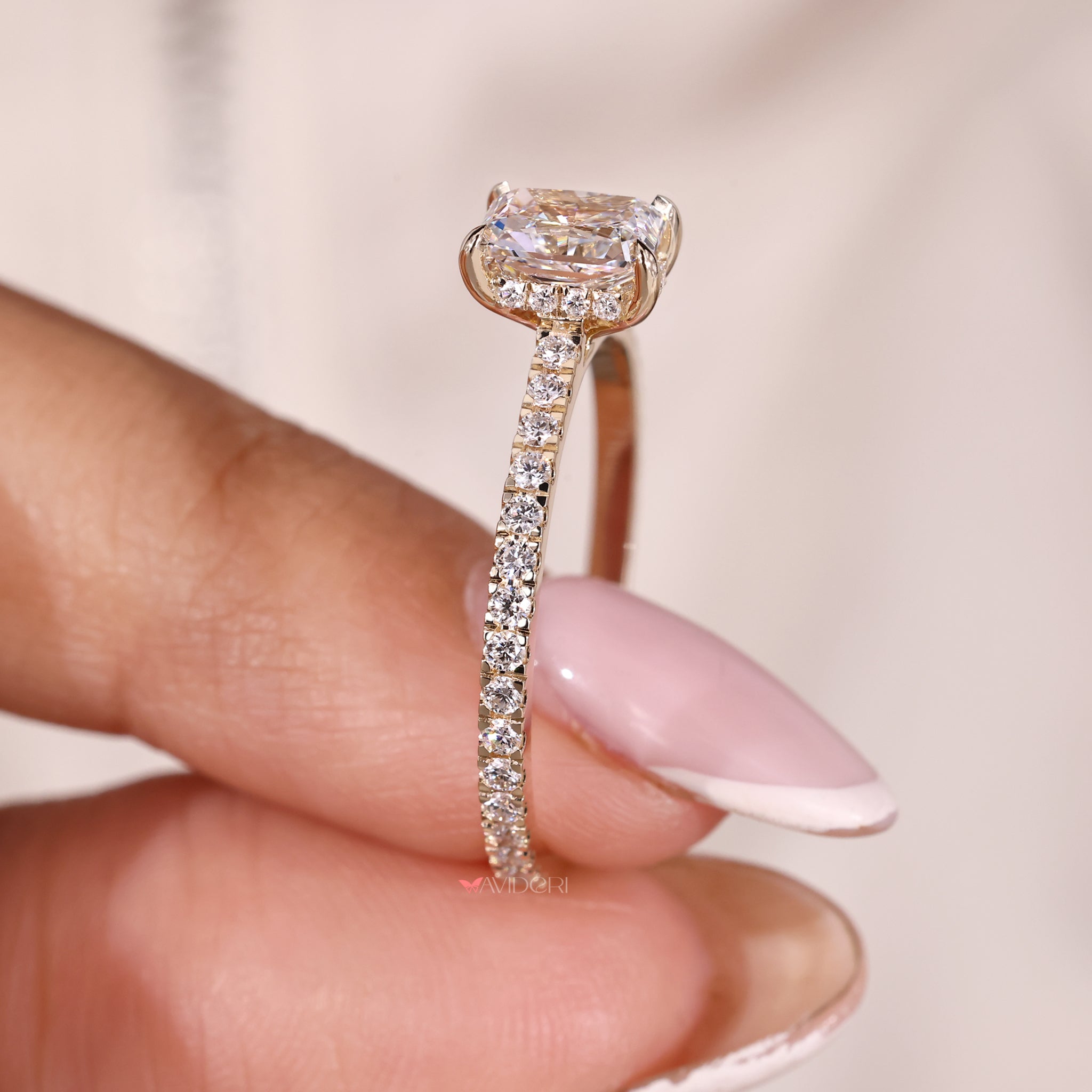 Prong setting, pave engagement ring, cathedral setting ring.