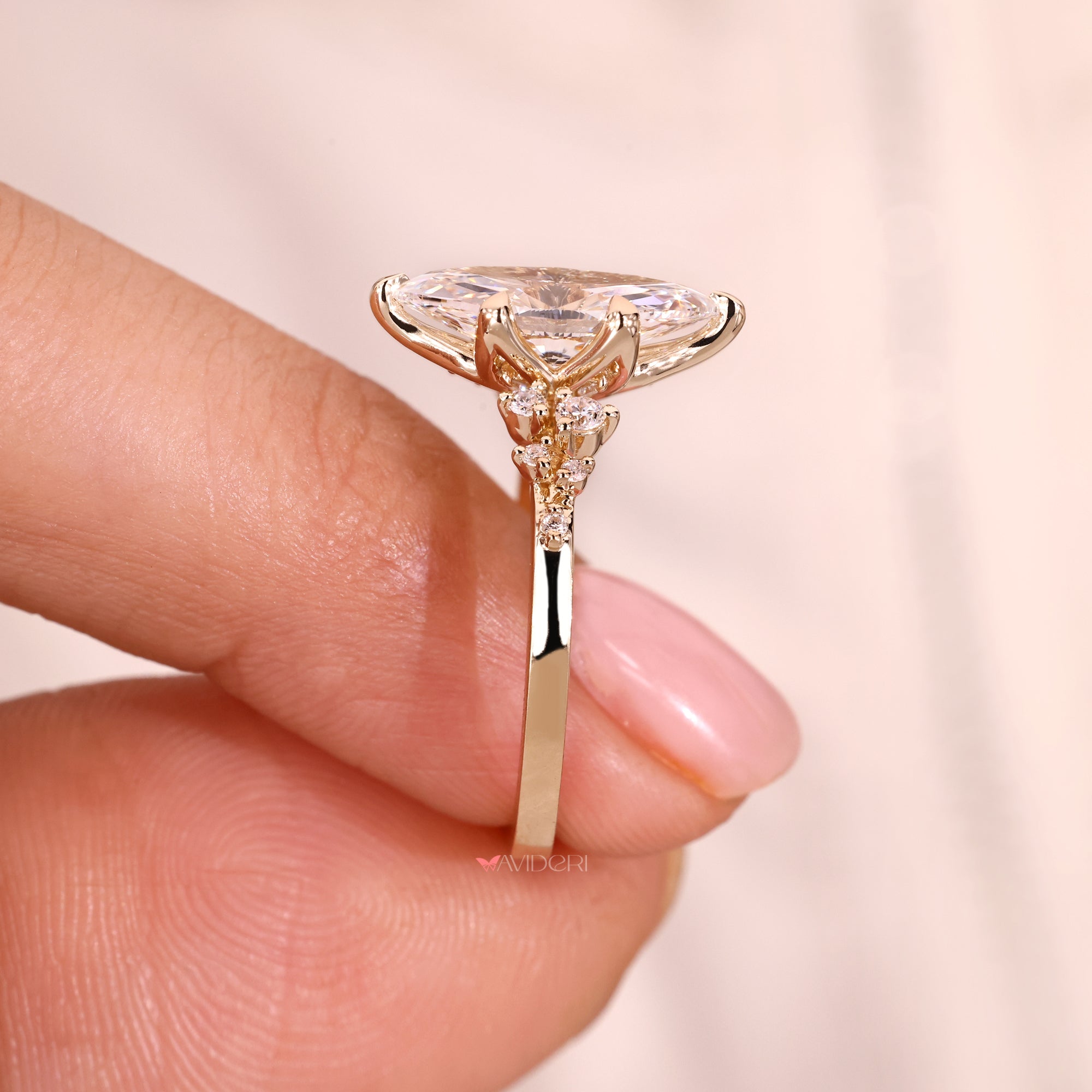 Yellow gold engagement ring with a polished handmade finish.