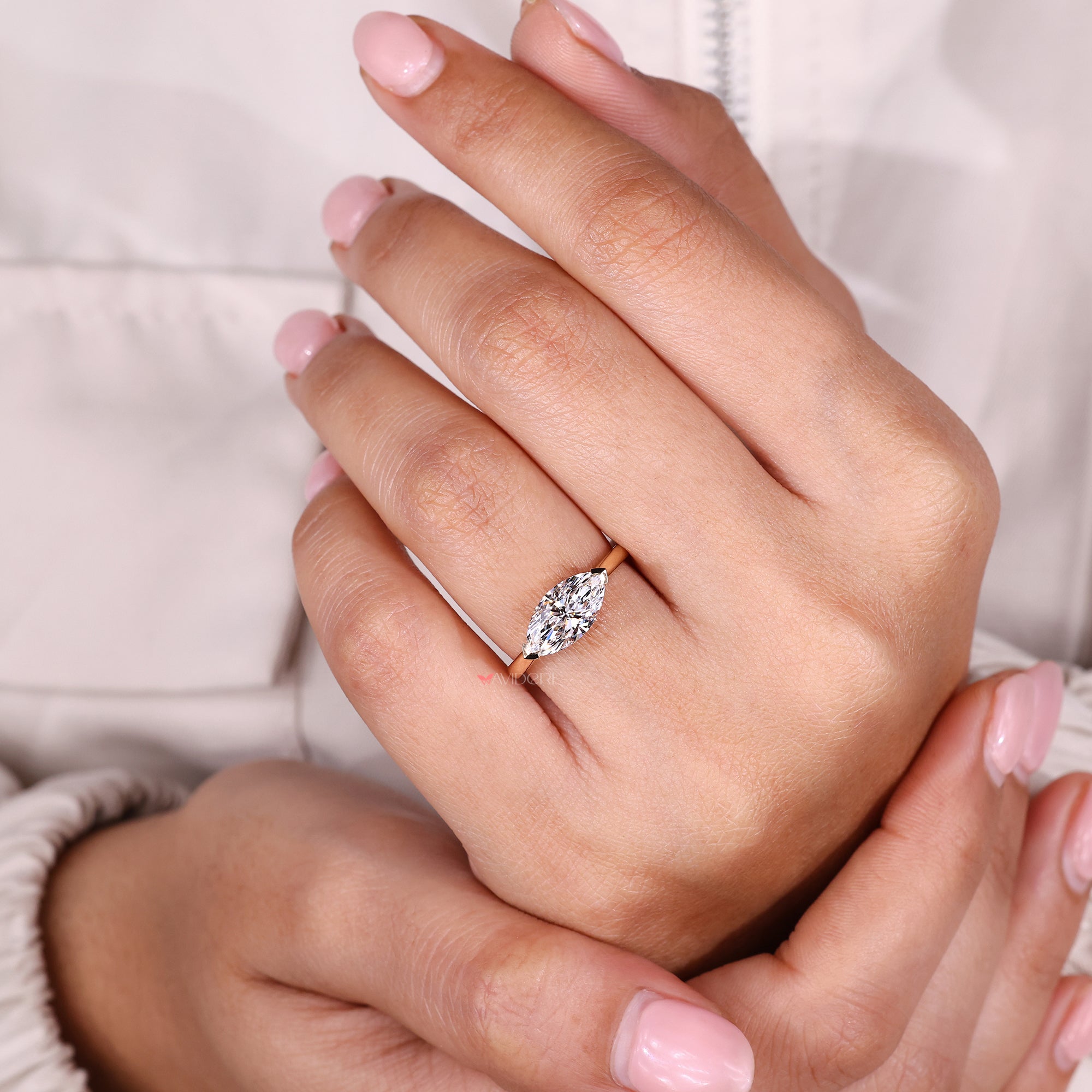 Avideri ring with yellow gold engagement ring.