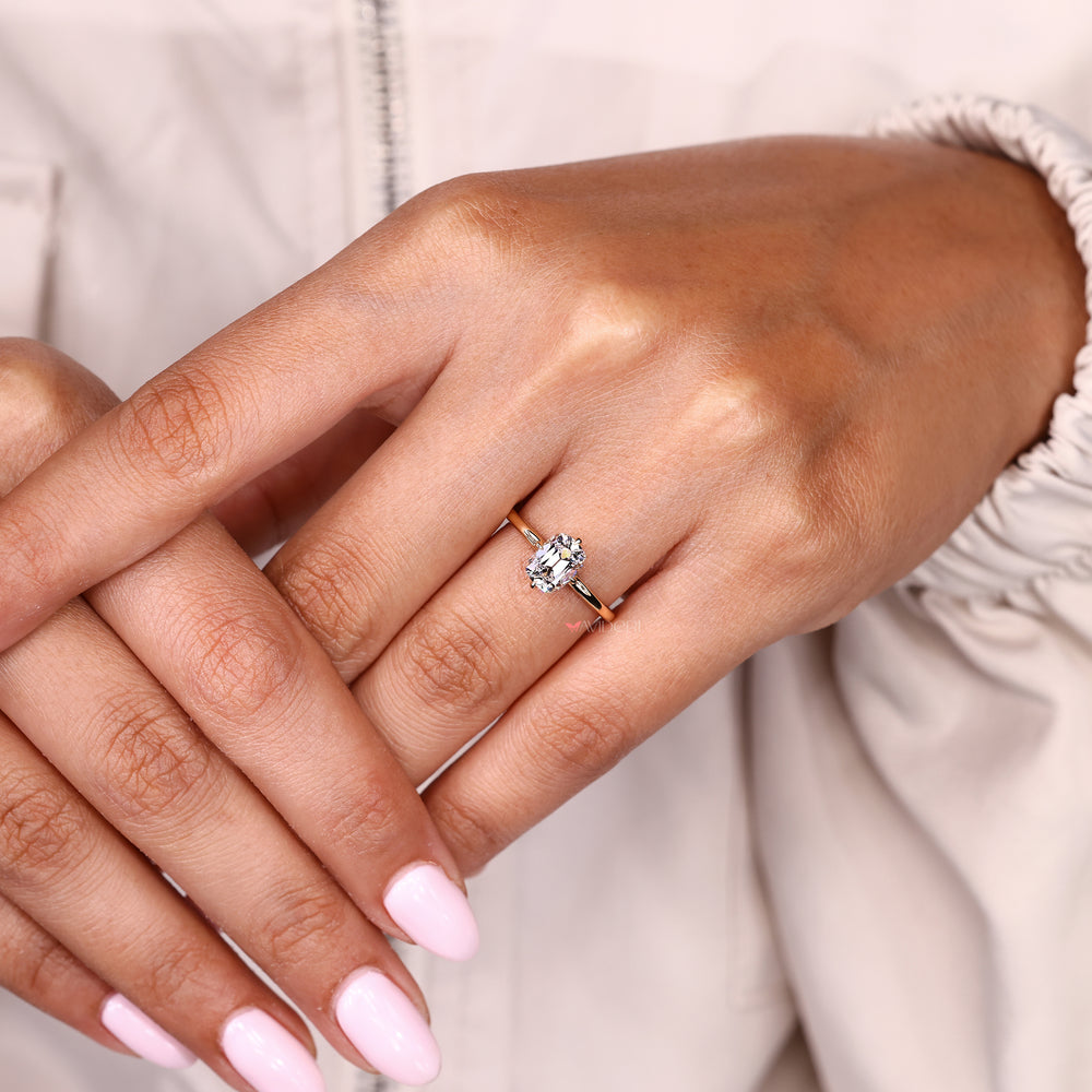 Solitaire cushion diamond ring with open gallery and halo

