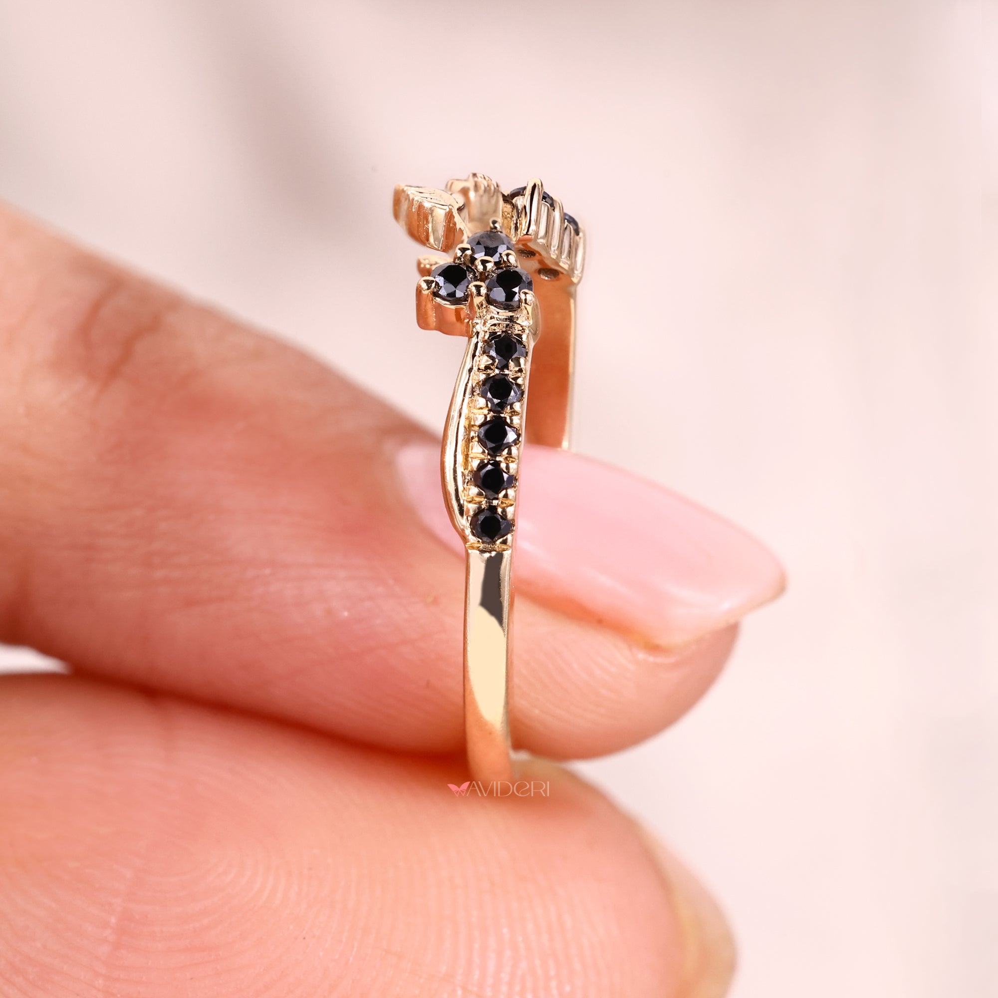 Black moissanite wedding band with simple open gap look and moissanite.