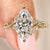 Marquise cut diamond ring solitaire vine style.
