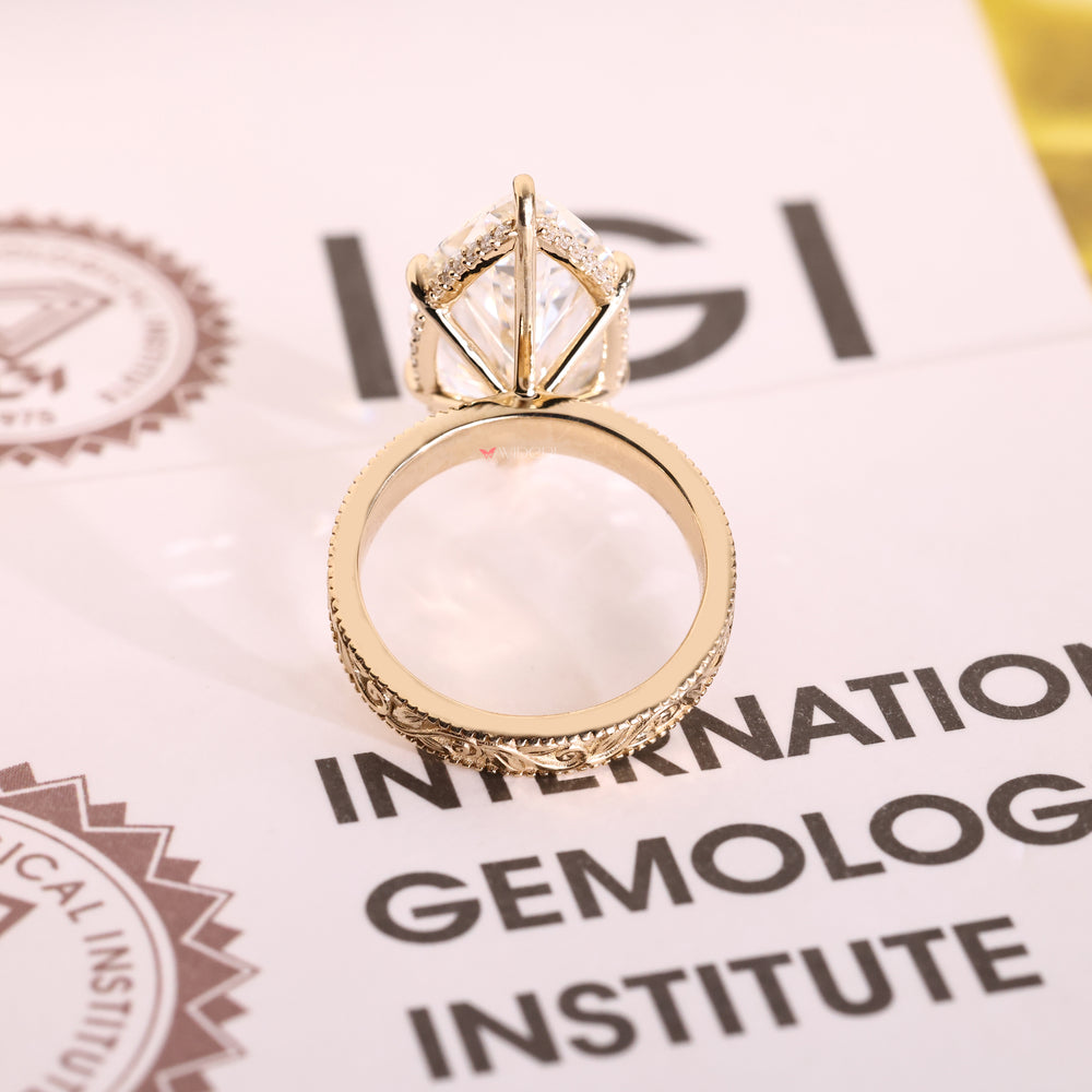 Yellow gold ring with hidden halo design.