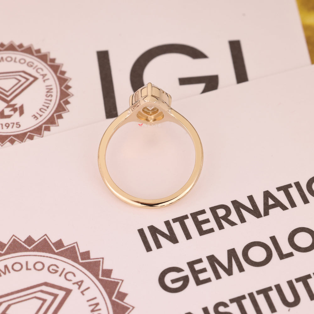 IGI certified stone in yellow gold engagement ring.
