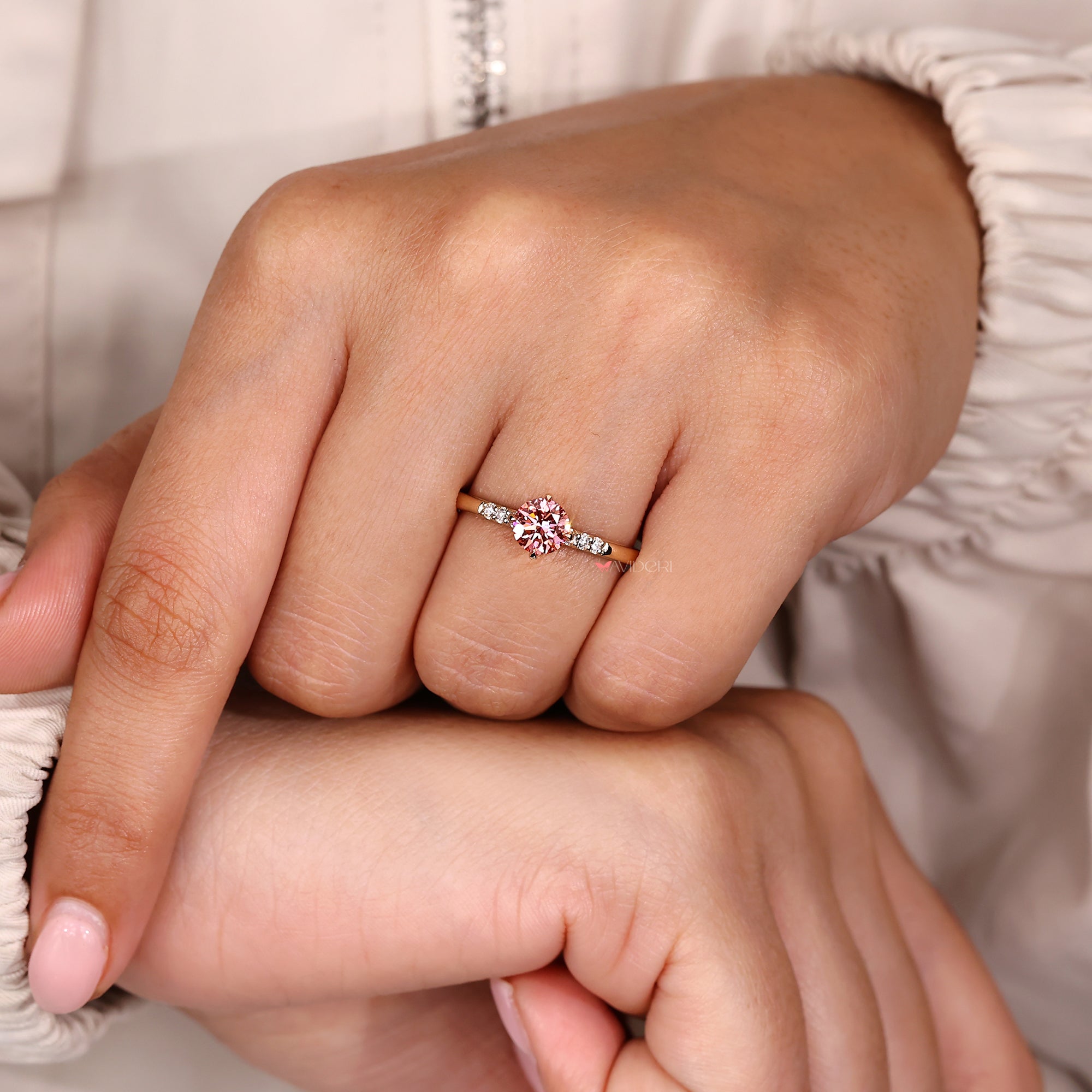 Handmade pink diamond engagement ring with IGI certification and custom design.