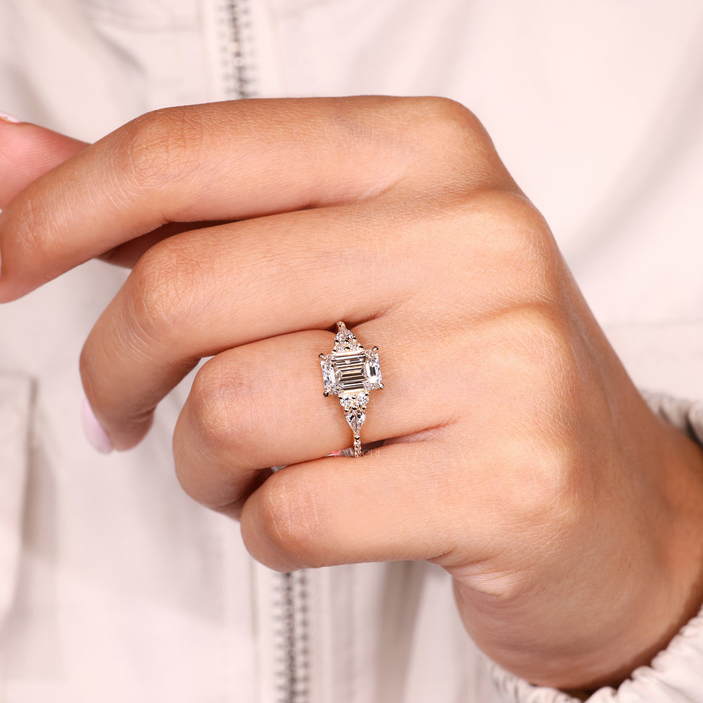 Lab grown emerald diamond ring with pave style band
