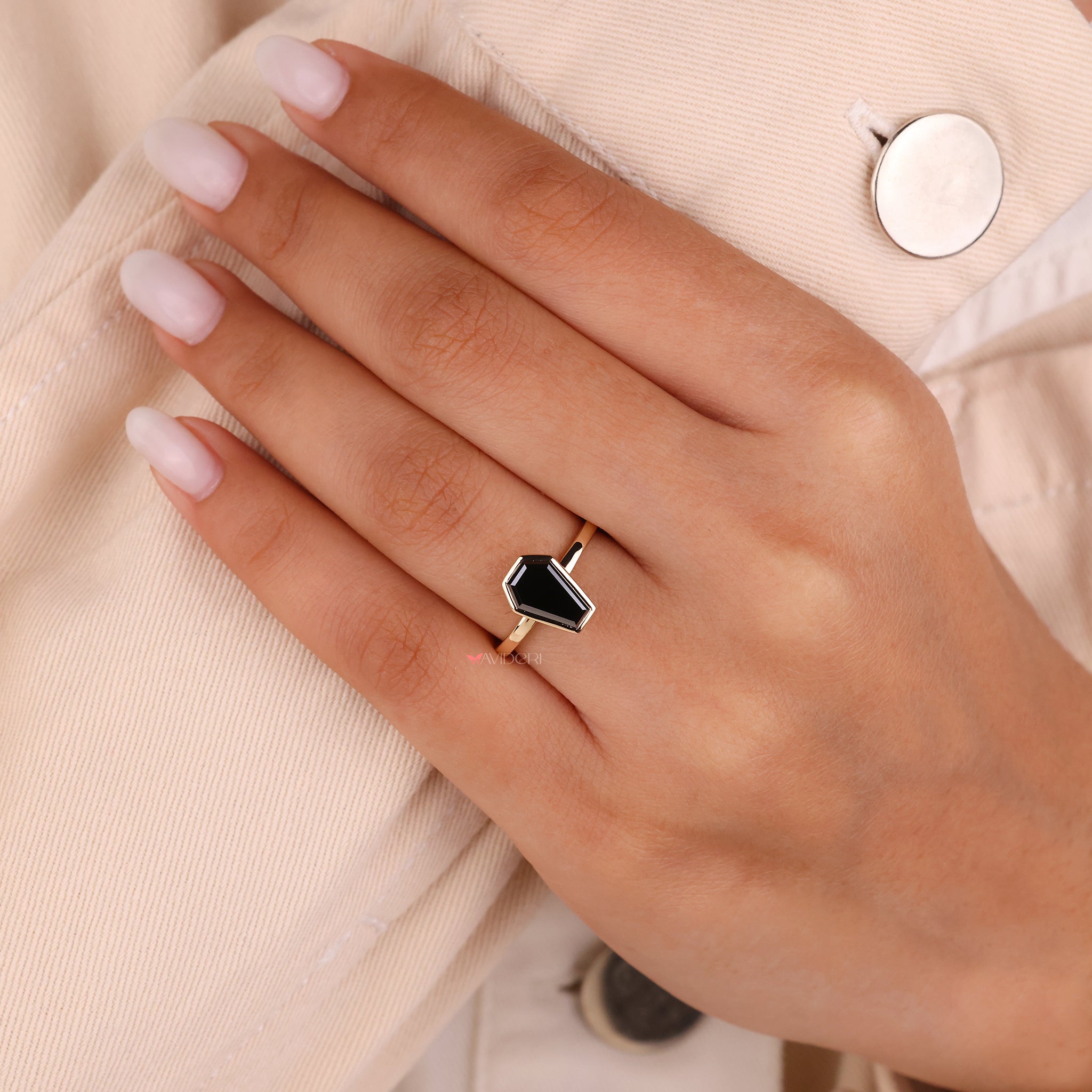 A touch of sophistication defines the bezel set ring with its refined design.
