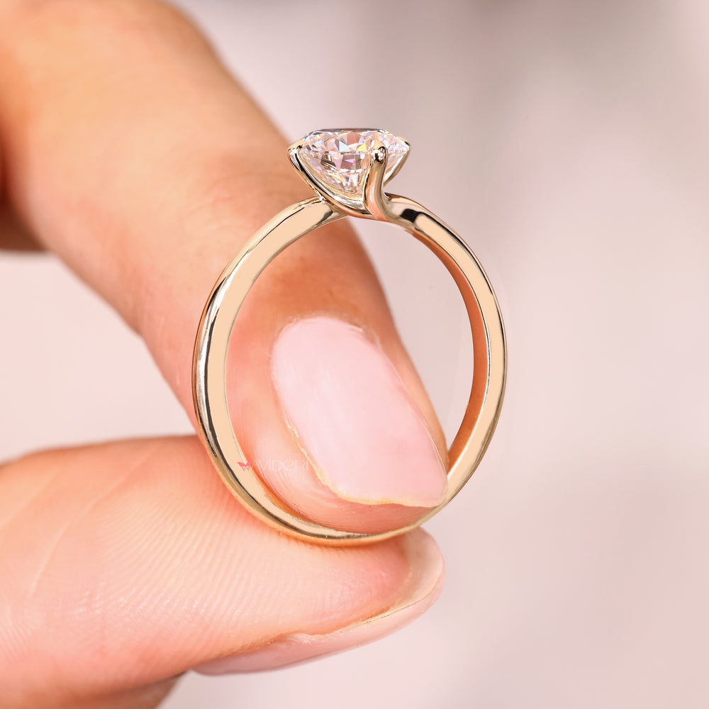 IGI certified round diamond ring with bypass band design.

