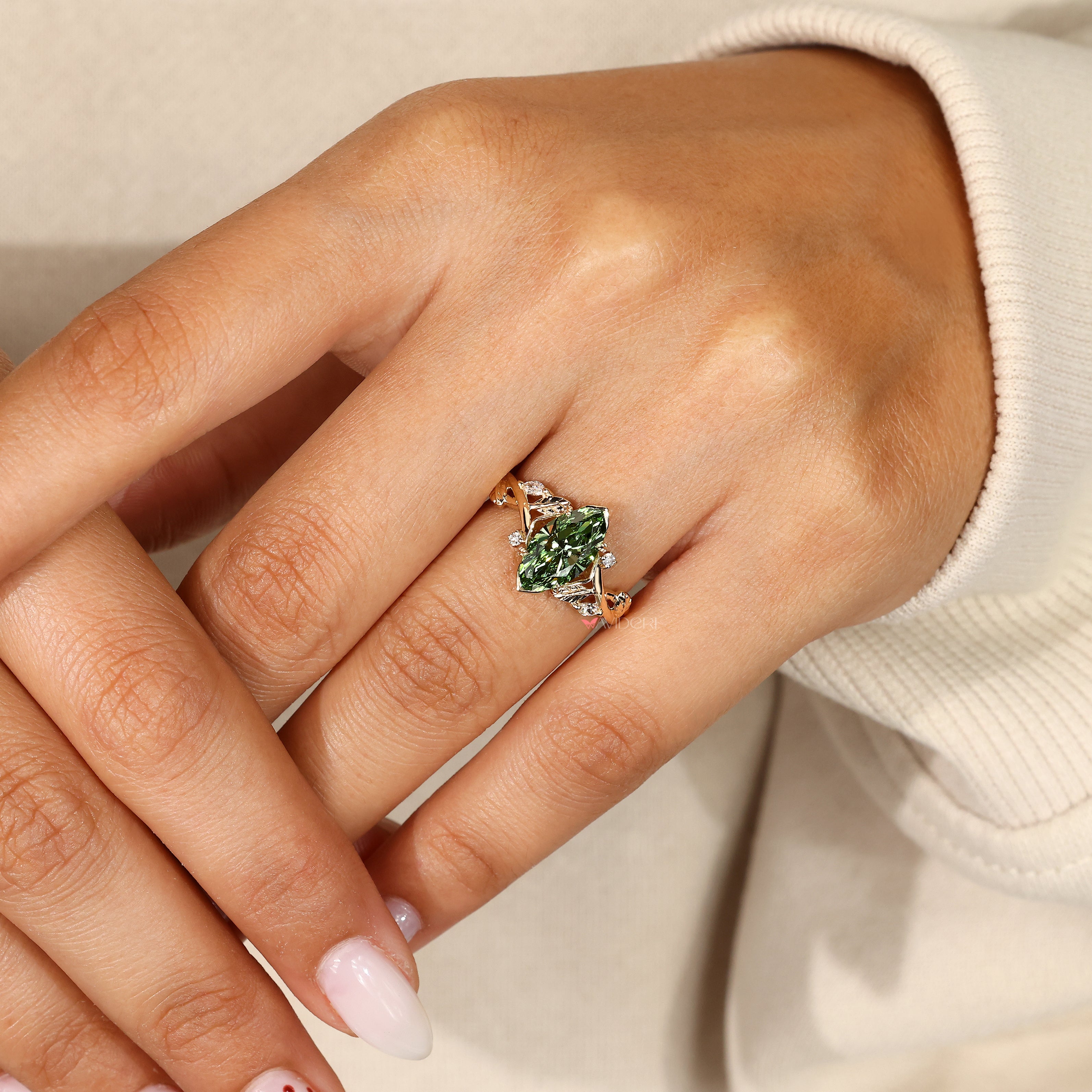 Nature inspired green diamond marquise ring.
