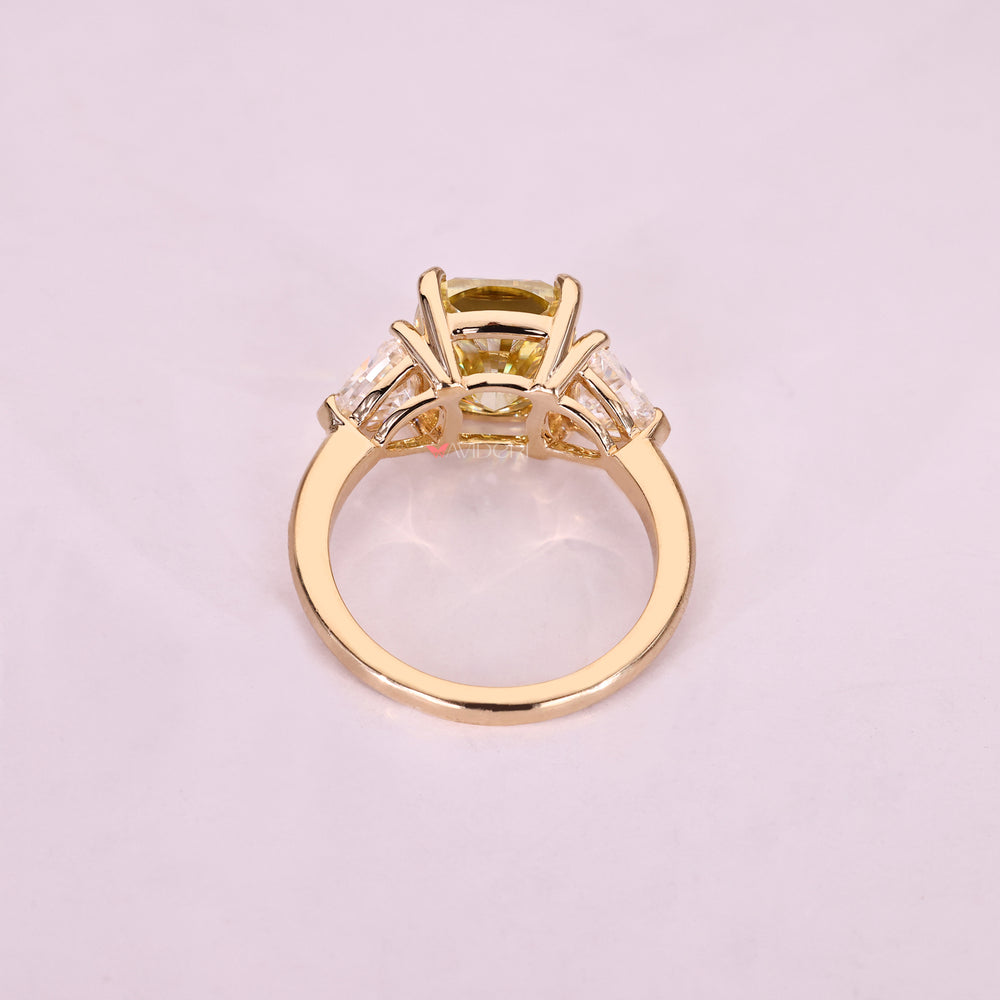 Handmade three stone moissanite ring with v prong setting.
