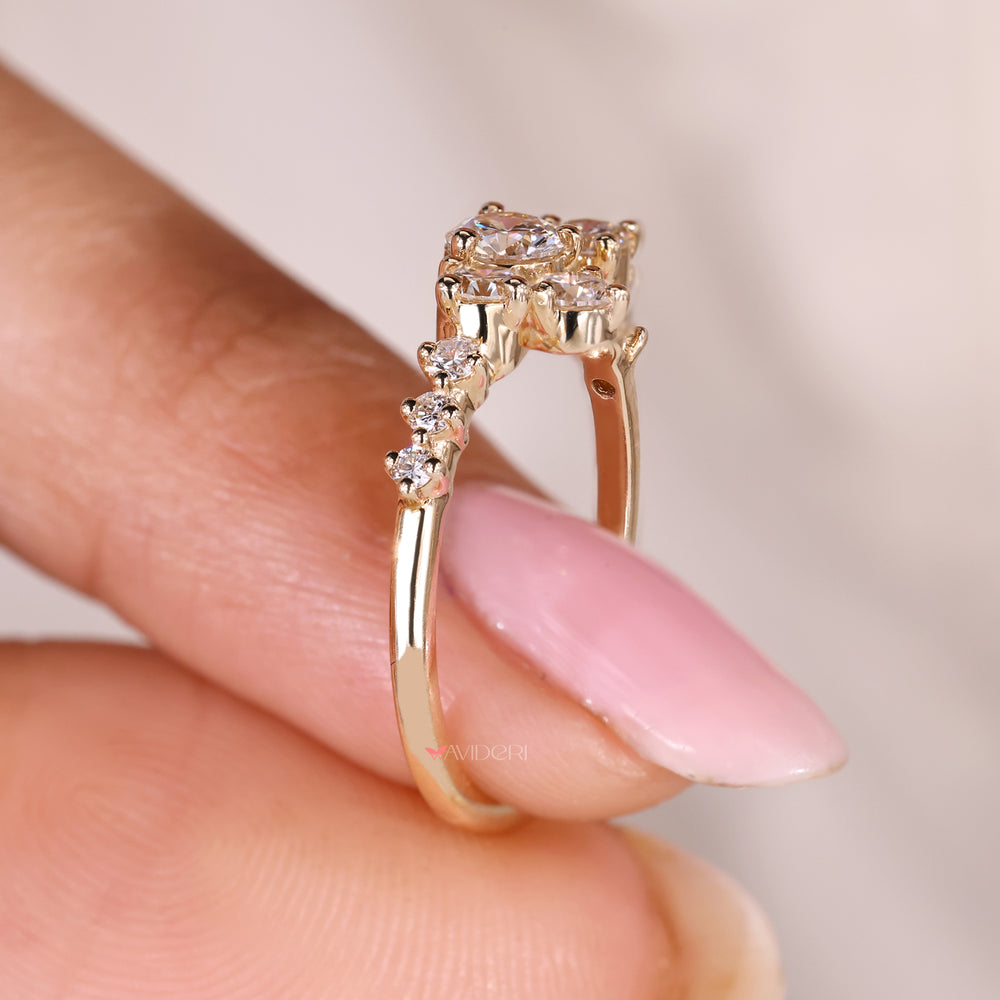 Lab grown round diamond engagement ring with cluster setting.