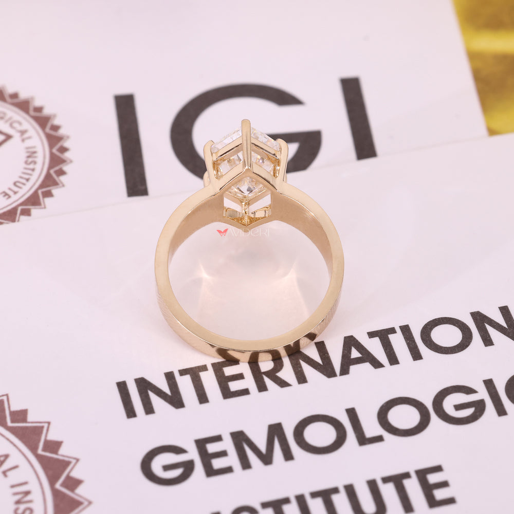 Yellow gold ring with dutch marquise center stone.
