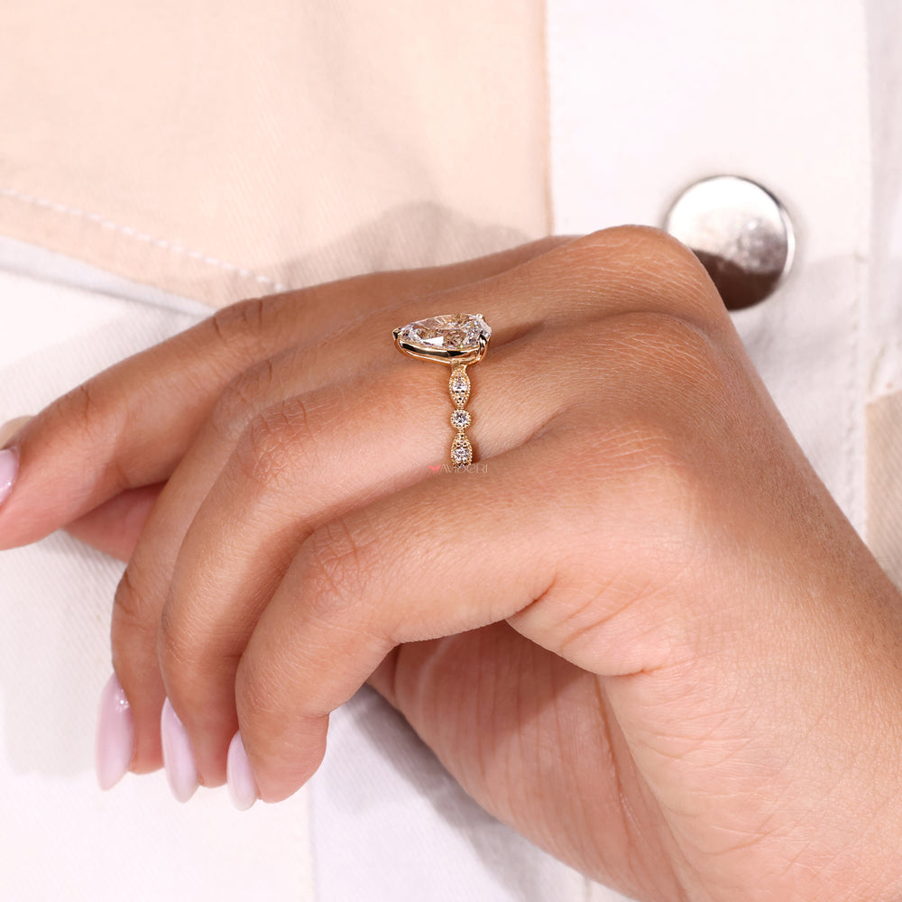Pear cut engagement ring with a sparkling pear shaped diamond.
