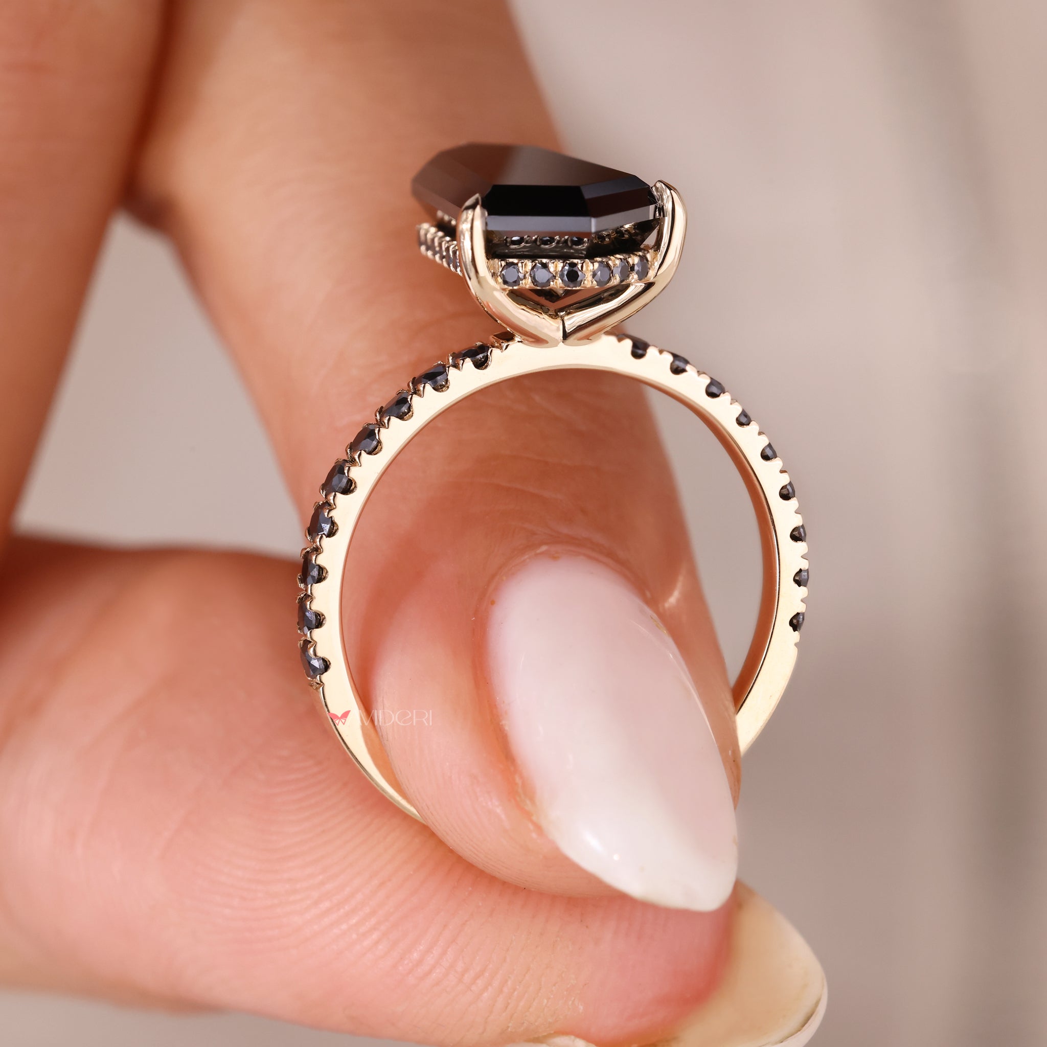 Pave setting ring with sparkling side stones along the band.
