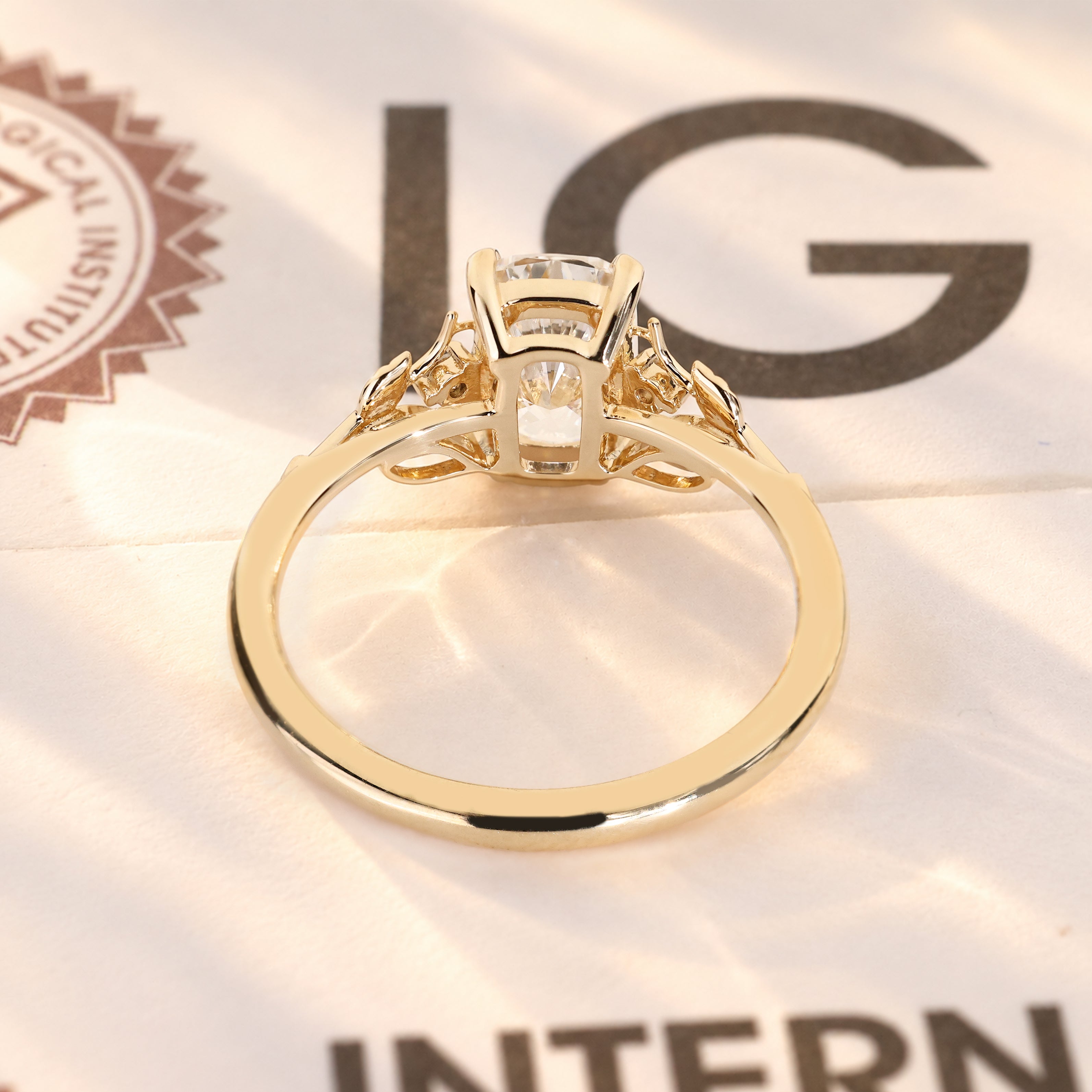 Fantasy ring with cushion cut diamond and side stones.
