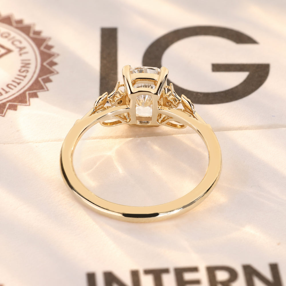 Fantasy ring with cushion cut diamond and side stones.
